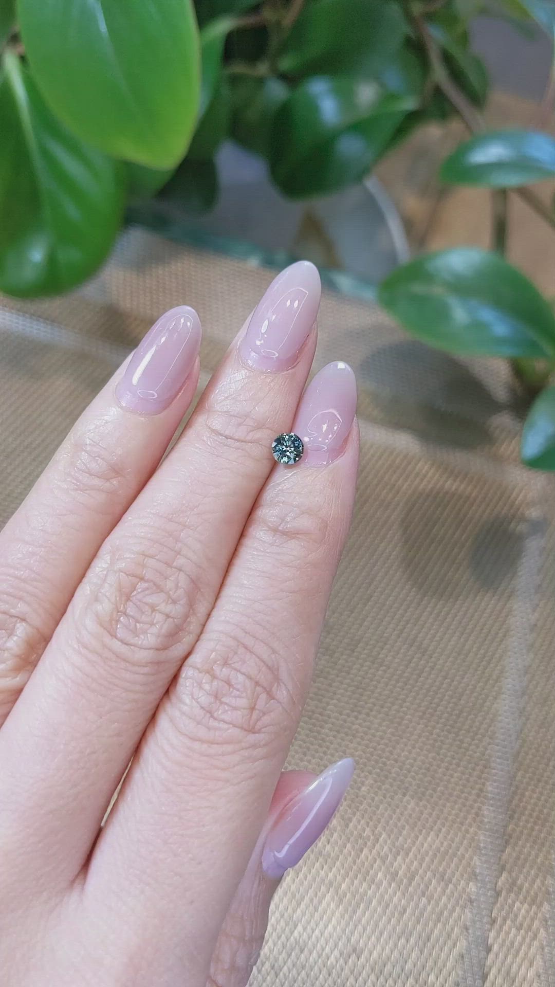 0.55 Ct. Greenish Brown Sapphire from Madagascar Size Video