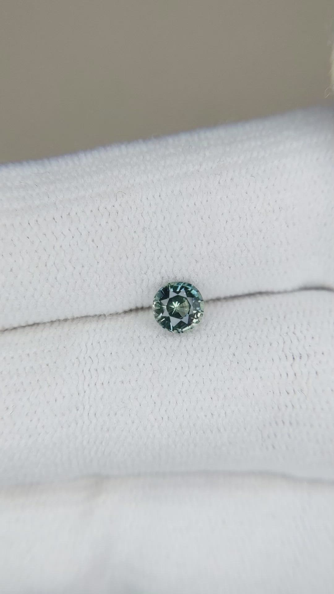 0.55 Ct. Greenish Brown Sapphire from Madagascar Size Video