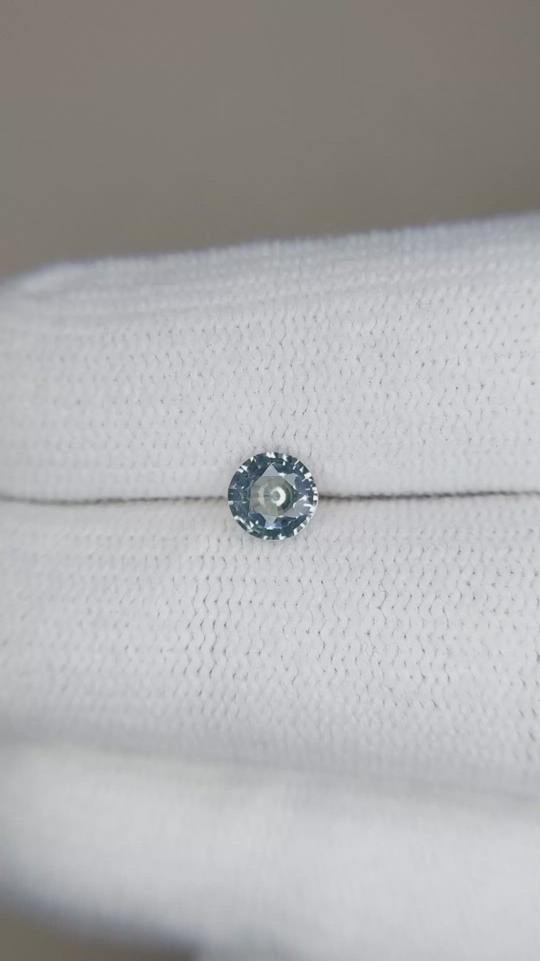 0.56 Ct. Greyish Blue Sapphire from Madagascar Size Video