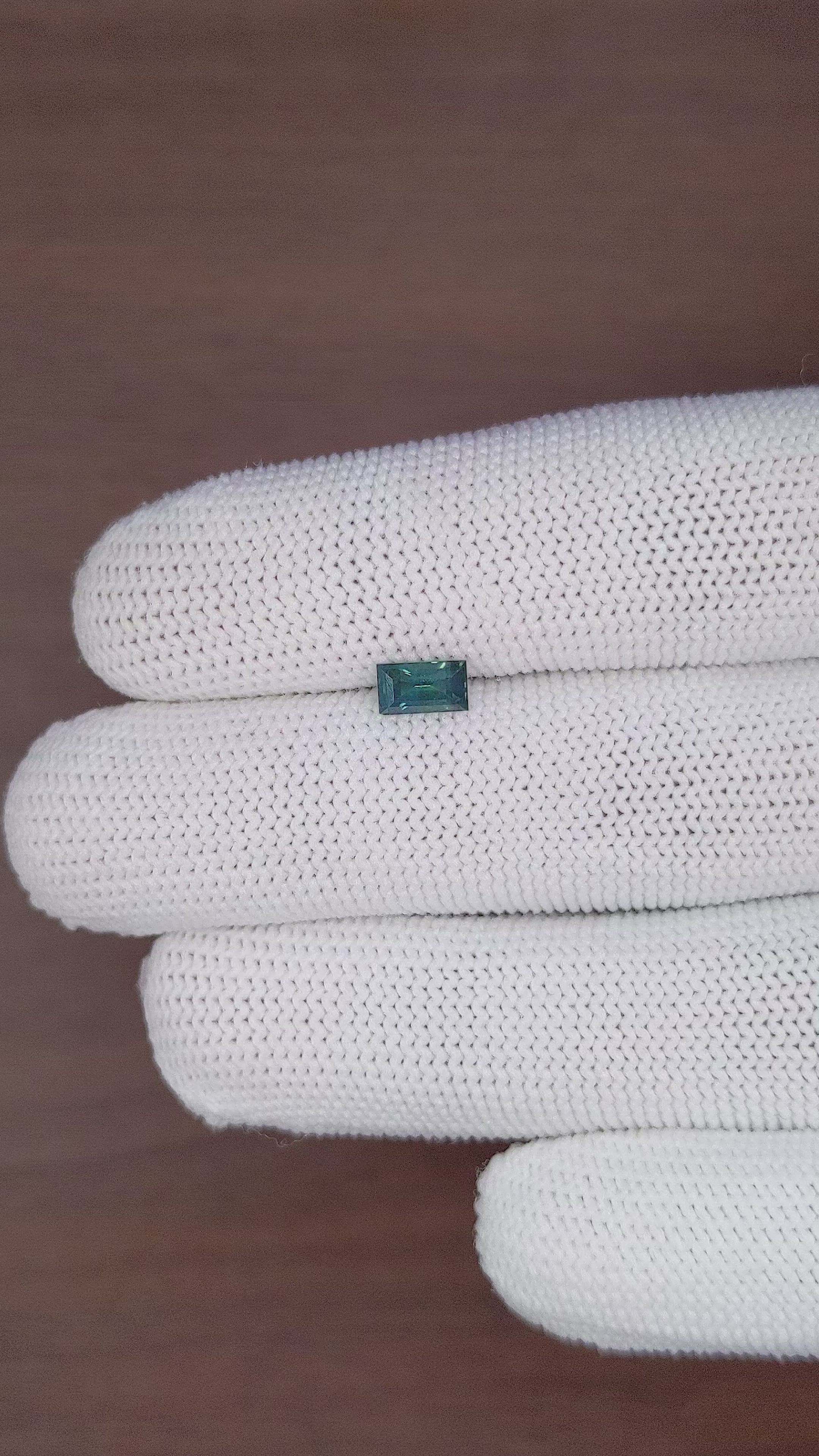 0.78 Ct. Bluish Green Sapphire from Madagascar Size Video