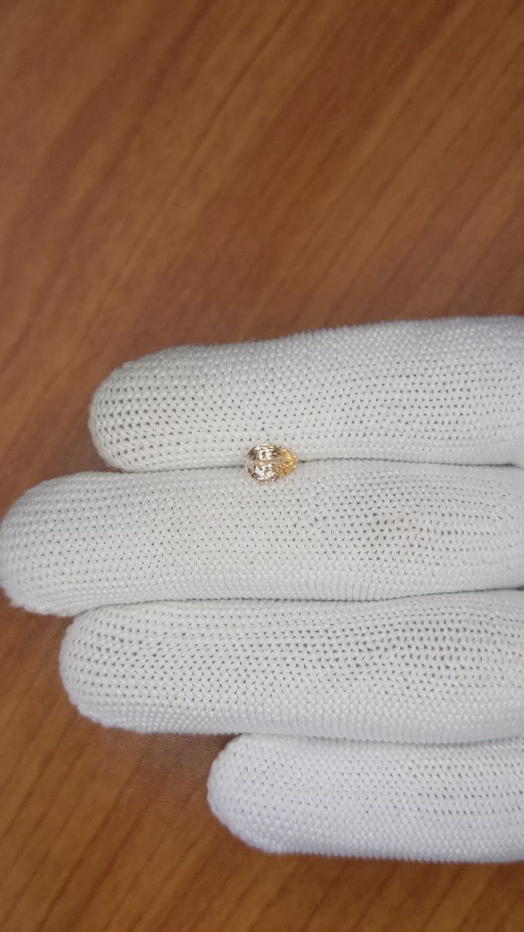 0.96 Ct. Peach Sapphire from Ceylon (Sri Lanka) Size Video