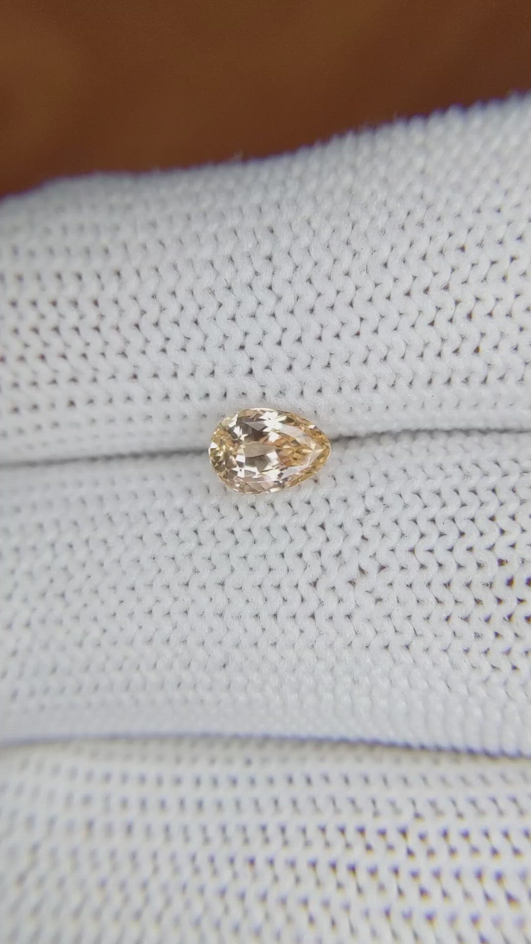 0.96 Ct. Peach Sapphire from Ceylon (Sri Lanka) Size Video