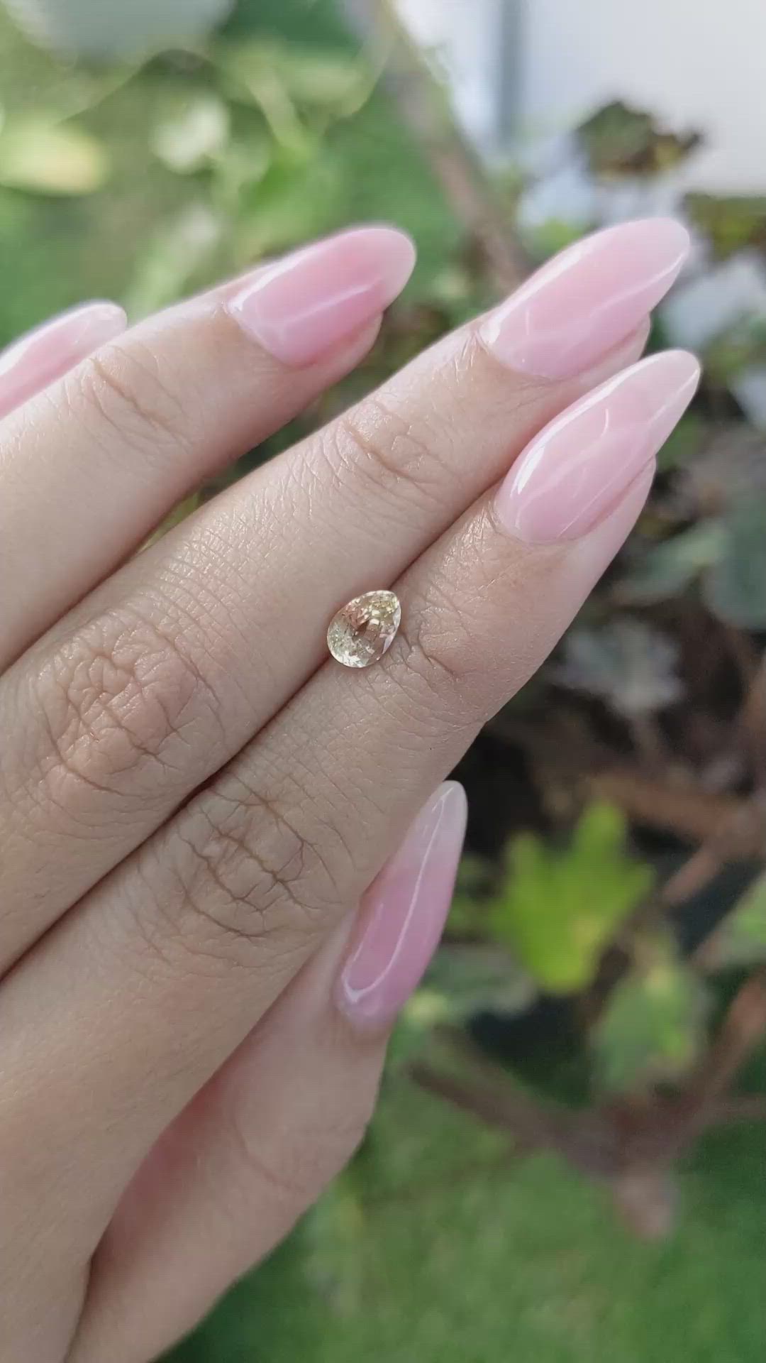 0.96 Ct. Peach Sapphire from Ceylon (Sri Lanka) Size Video