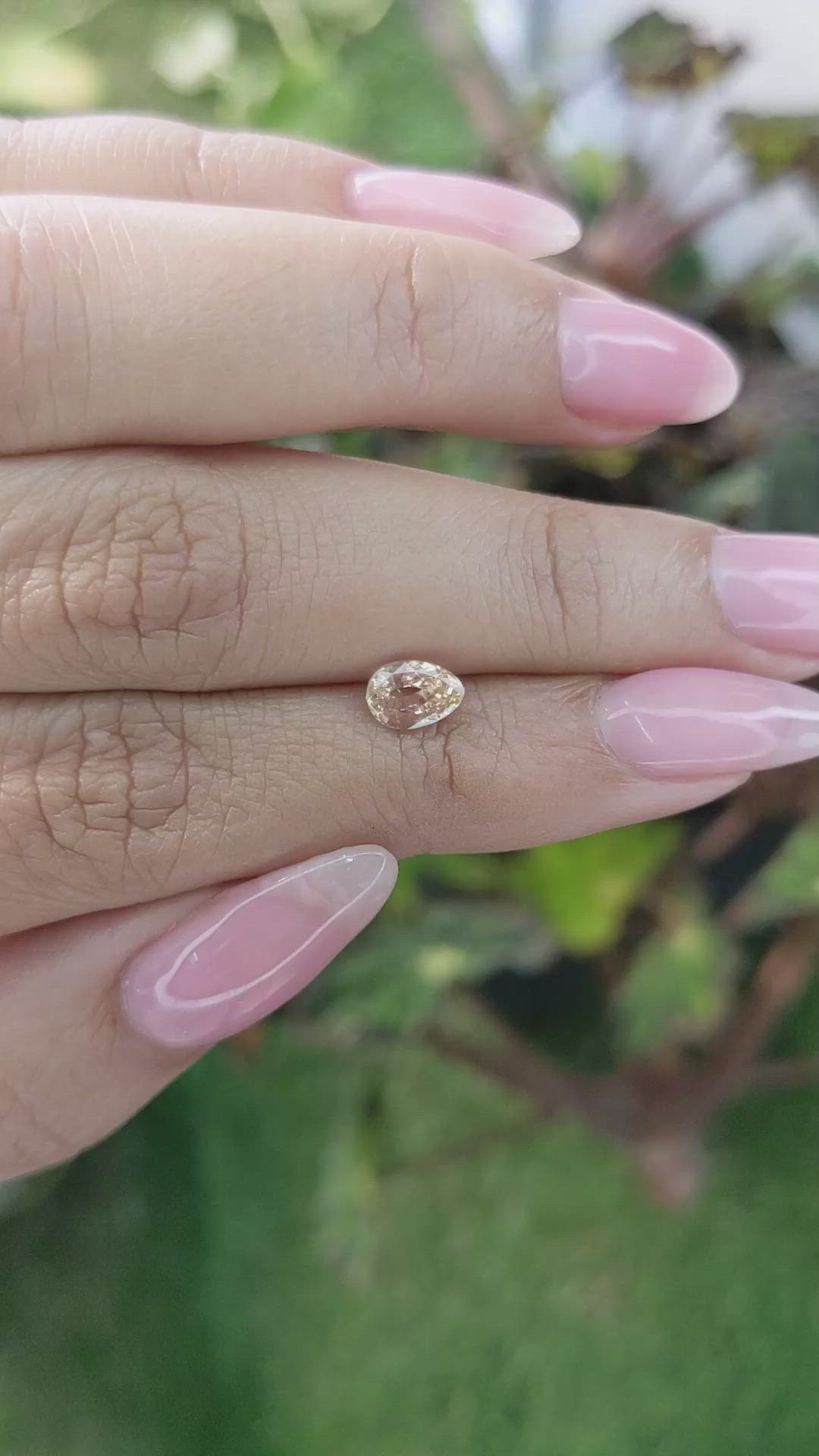 0.96 Ct. Peach Sapphire from Ceylon (Sri Lanka) Size Video