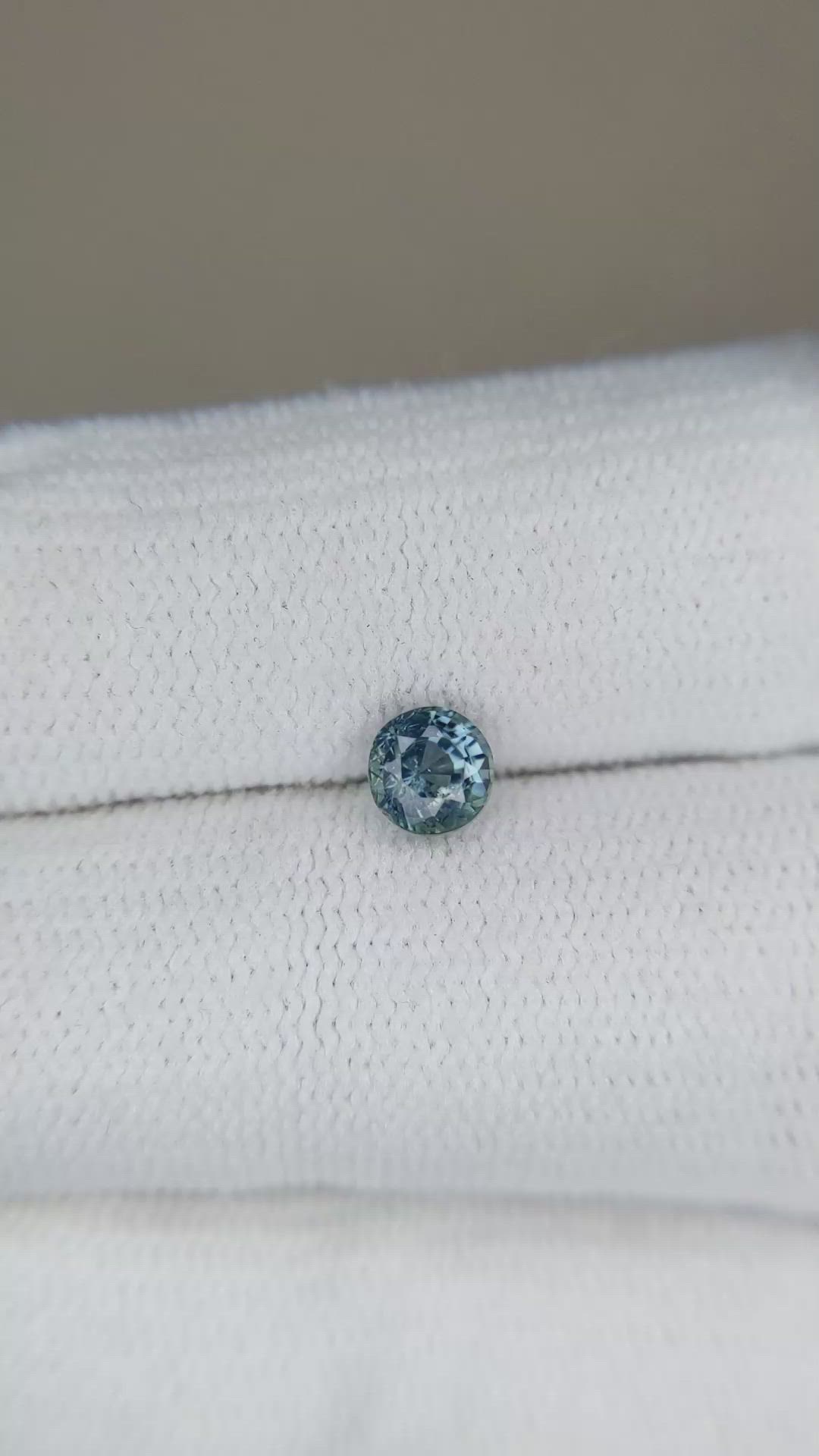 0.63 Ct. Greenish Blue Sapphire from Madagascar Size Video