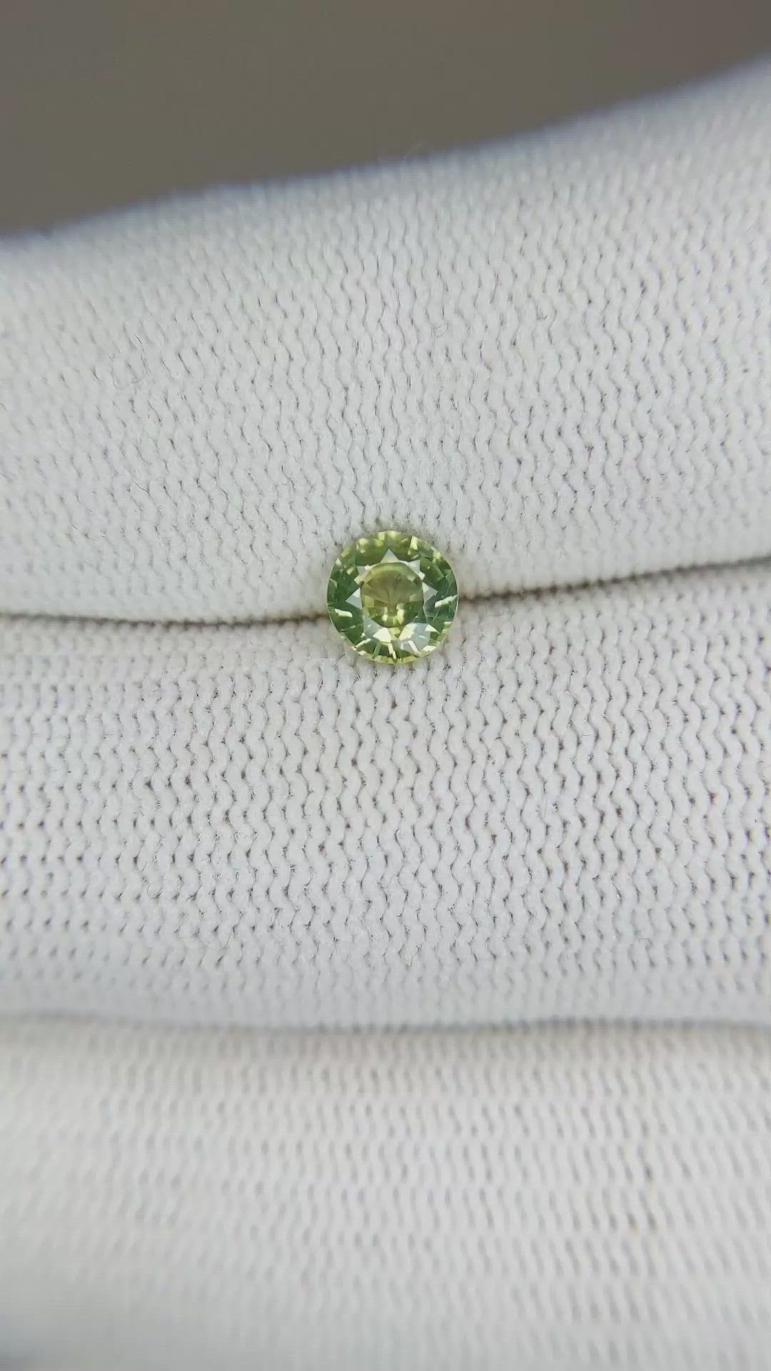 0.66 Ct. Yellowish Green Sapphire from Madagascar Size Video