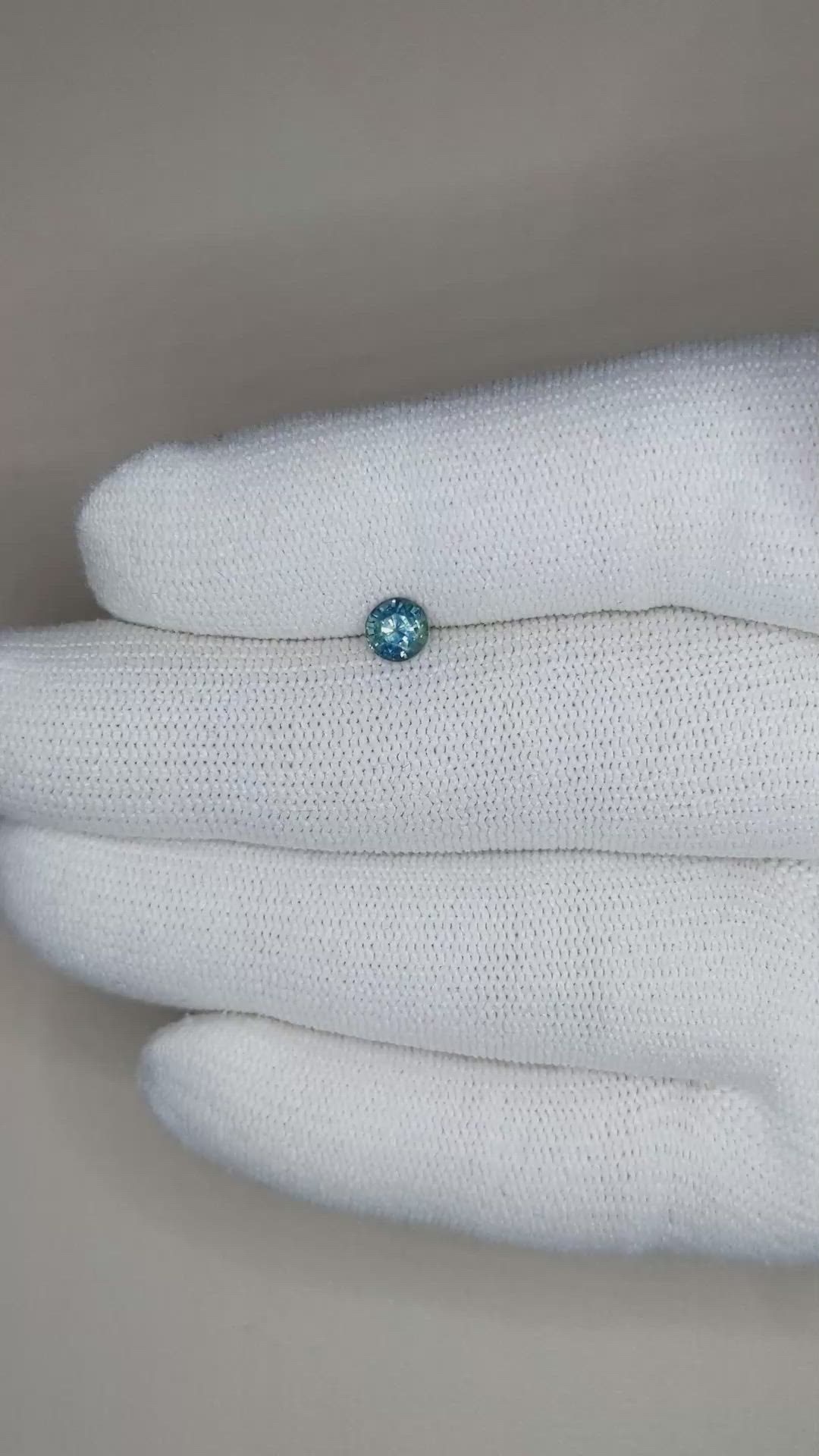 0.54 Ct. Bluish Green Sapphire from Madagascar Size Video