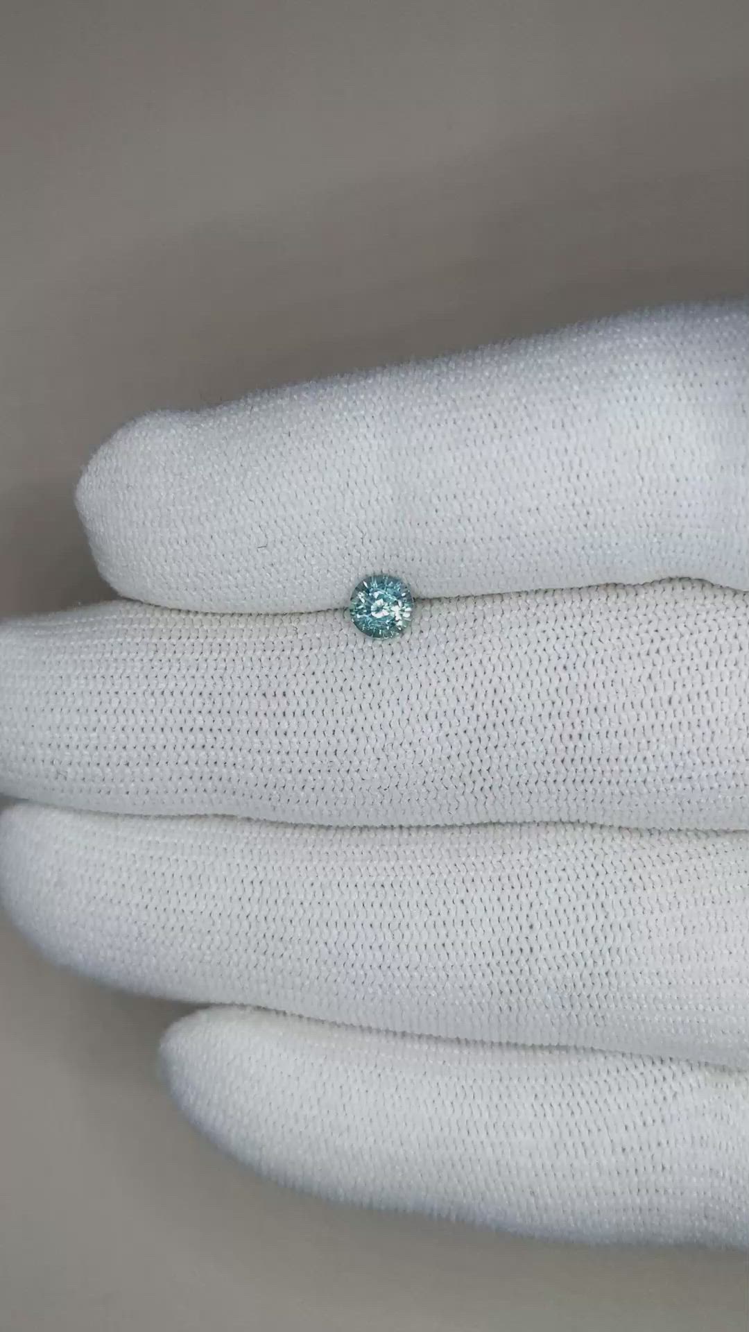 0.57 Ct. Greyish Blue Sapphire from Madagascar Size Video