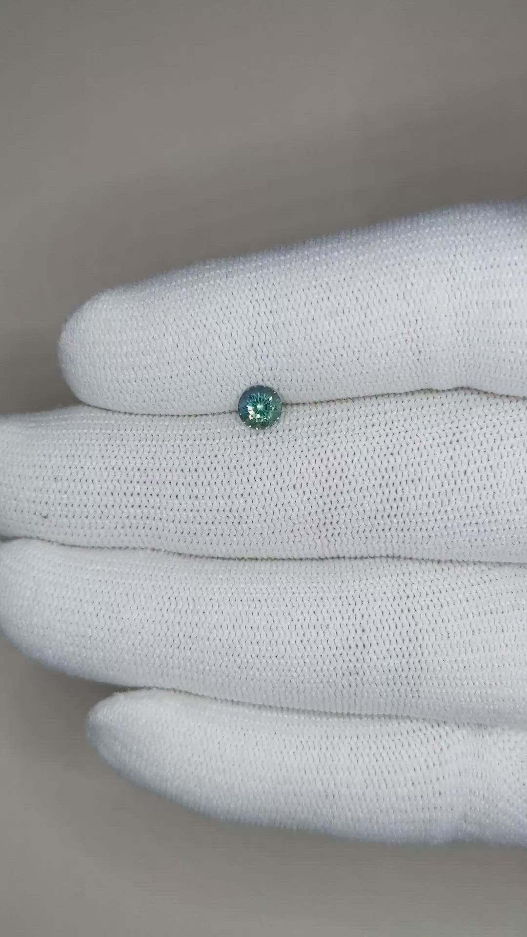 0.56 Ct. Bluish Green Sapphire from Madagascar Size Video