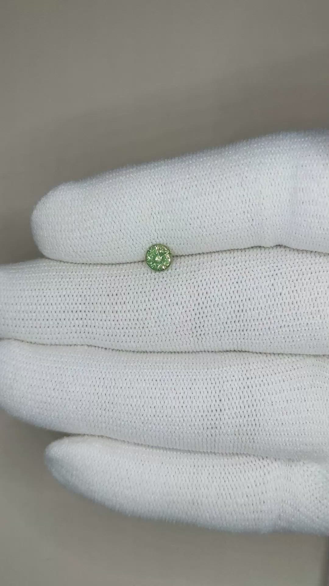 0.60 Ct. Yellowish Green Sapphire from Madagascar Size Video