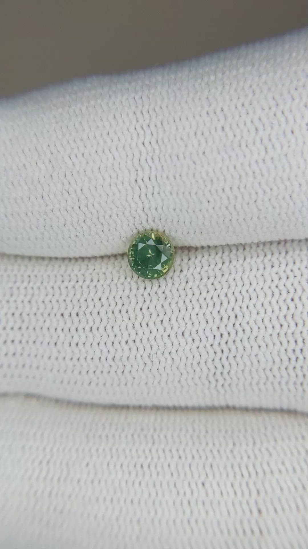 0.60 Ct. Yellowish Green Sapphire from Madagascar Size Video