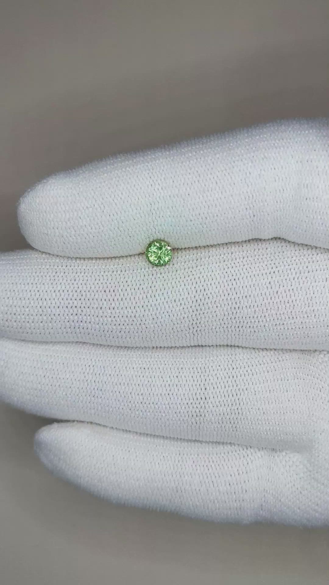 0.53 Ct. Yellowish Green Sapphire from Madagascar Size Video