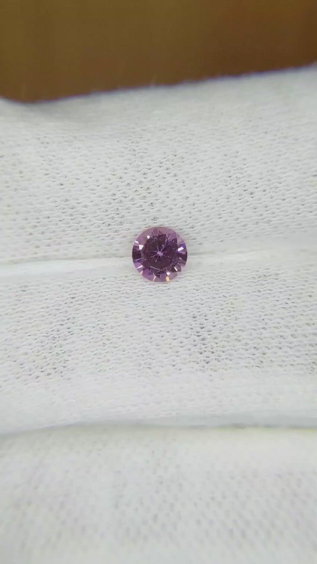 0.61 Ct. Purplish Pink Sapphire from Ceylon (Sri Lanka) Size Video