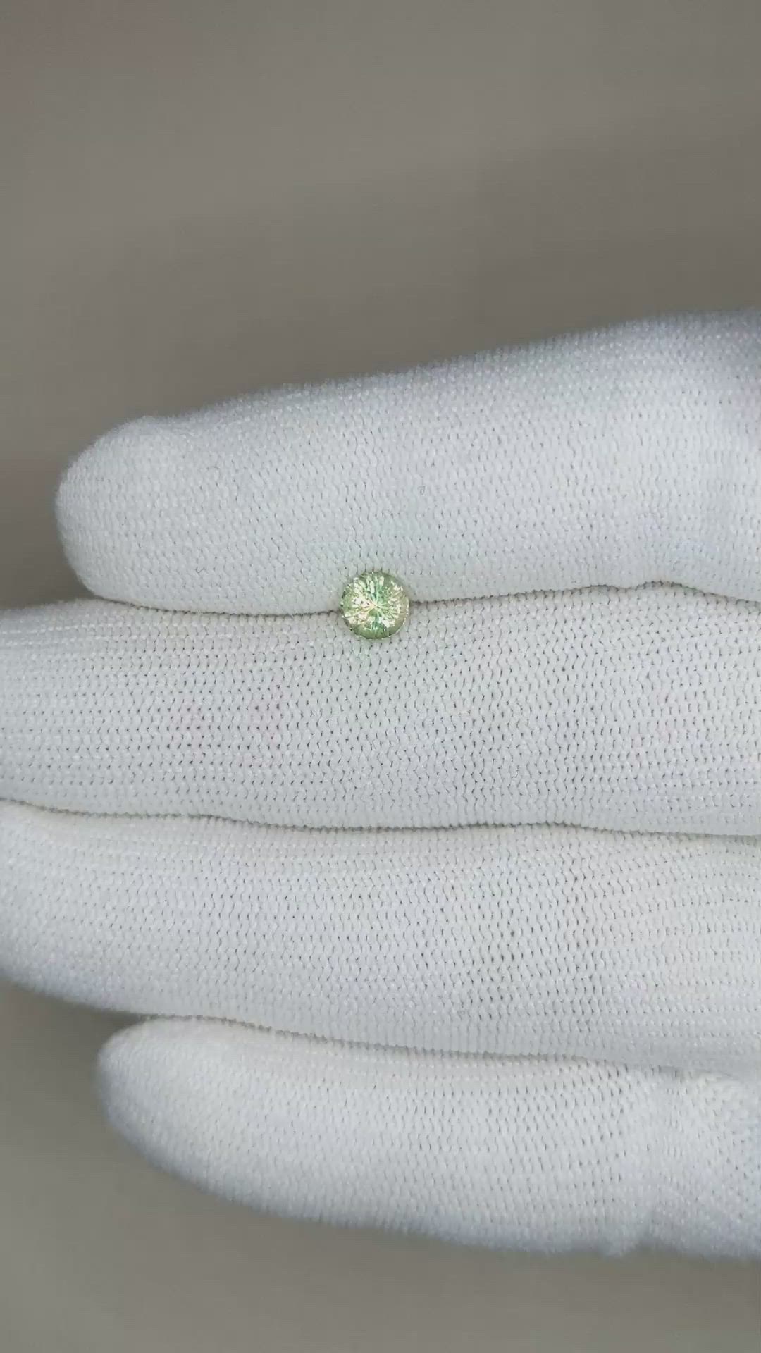 0.68 Ct. Yellowish Green Sapphire from Madagascar Size Video