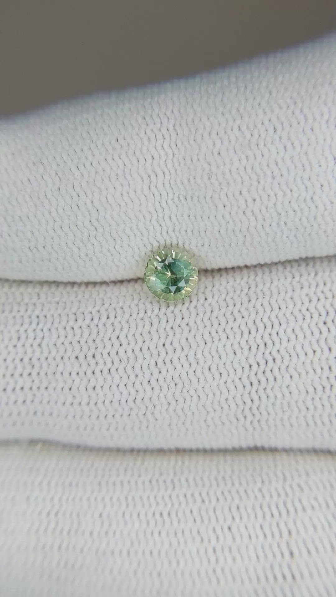 0.68 Ct. Yellowish Green Sapphire from Madagascar Size Video