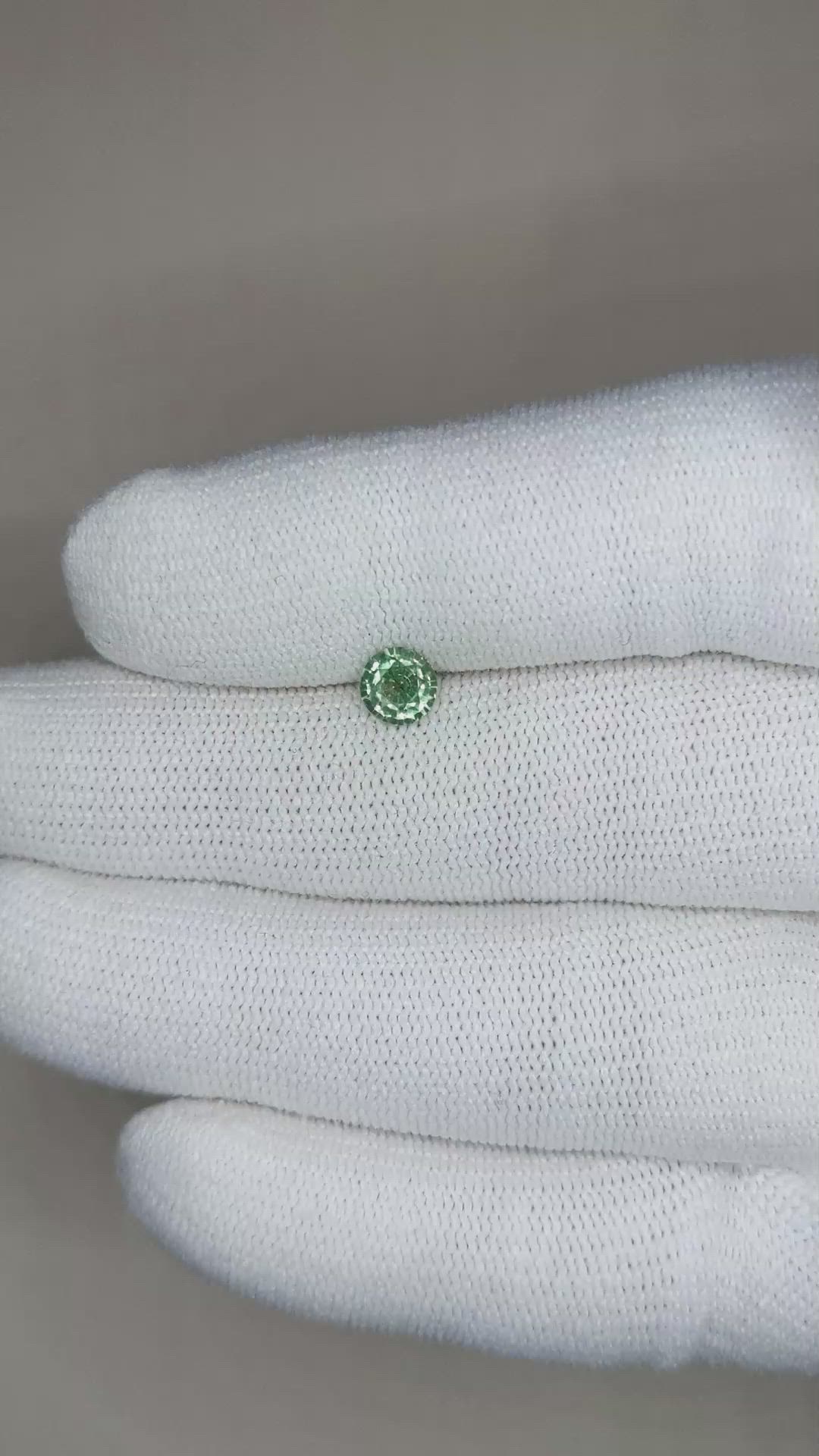 0.52 Ct. Yellowish Green Sapphire from Madagascar Size Video