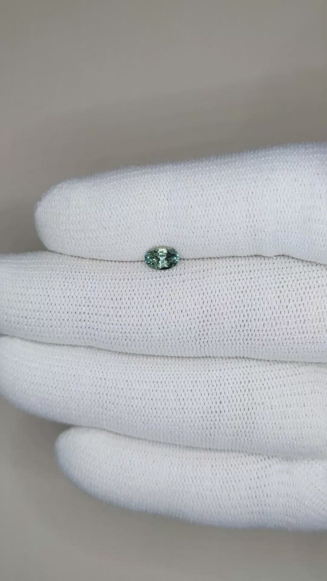 0.63 Ct. Bluish Green Sapphire from Madagascar Size Video