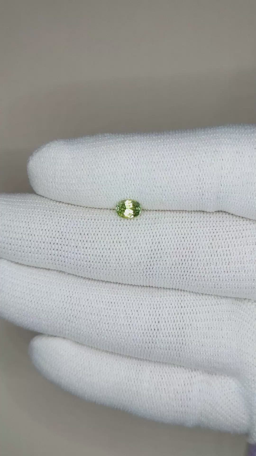 0.60 Ct. Yellowish Green Sapphire from Madagascar Size Video