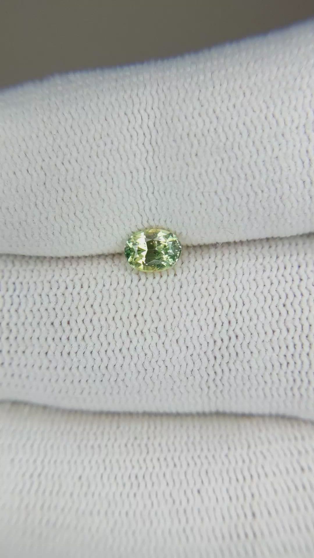 0.60 Ct. Yellowish Green Sapphire from Madagascar Size Video