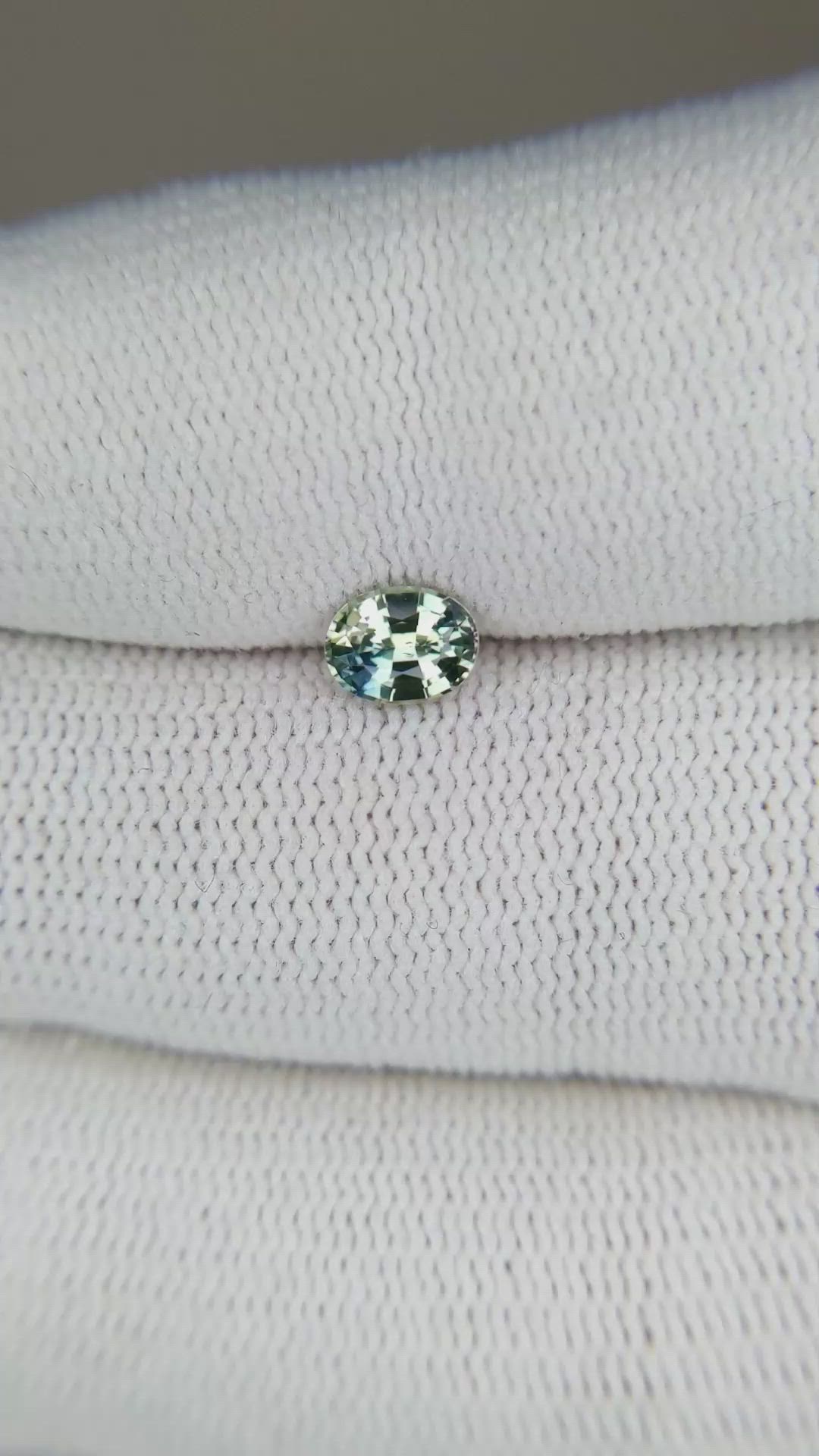 0.58 Ct. Bluish Green Sapphire from Madagascar Size Video