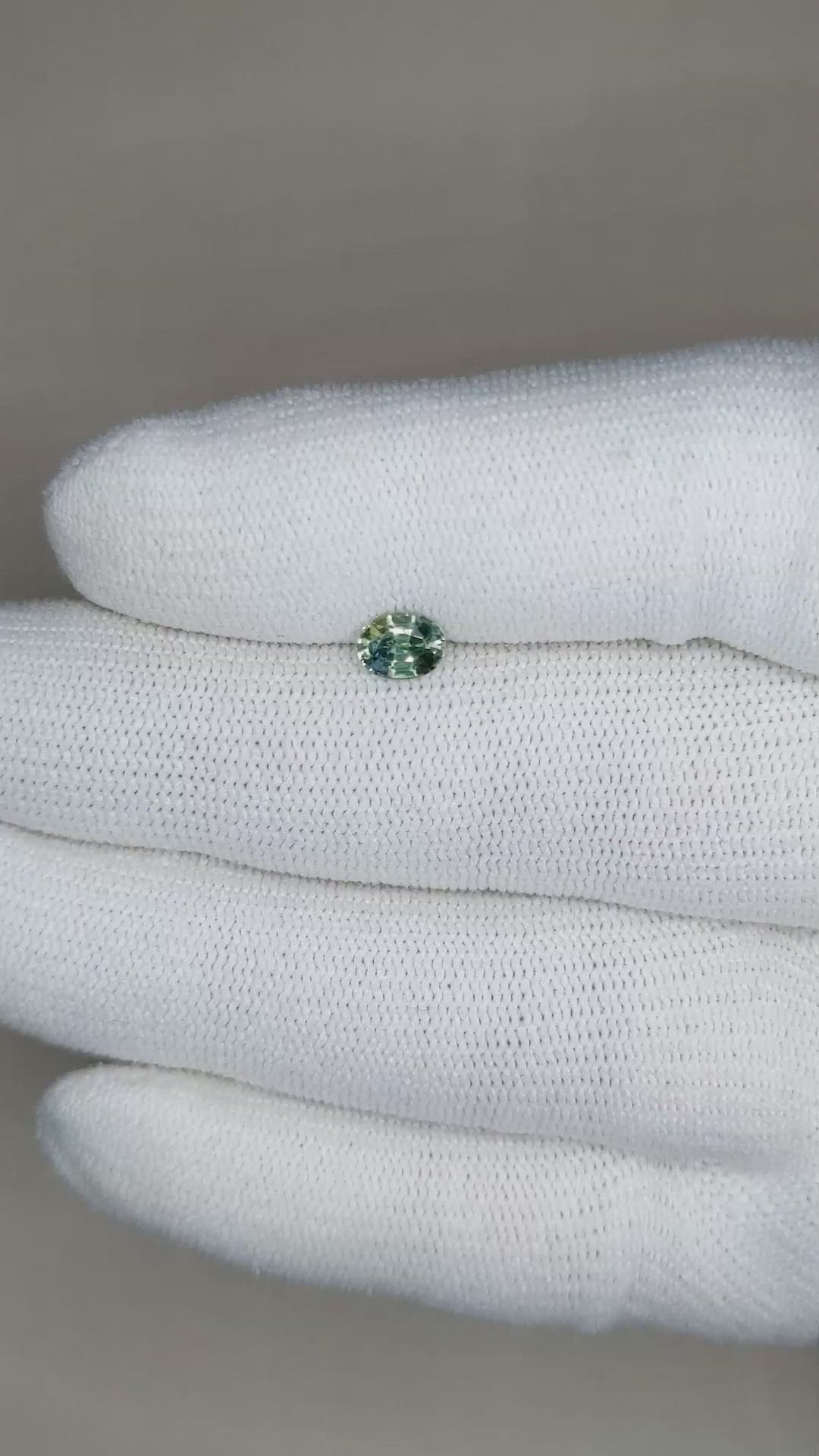 0.58 Ct. Bluish Green Sapphire from Madagascar Size Video