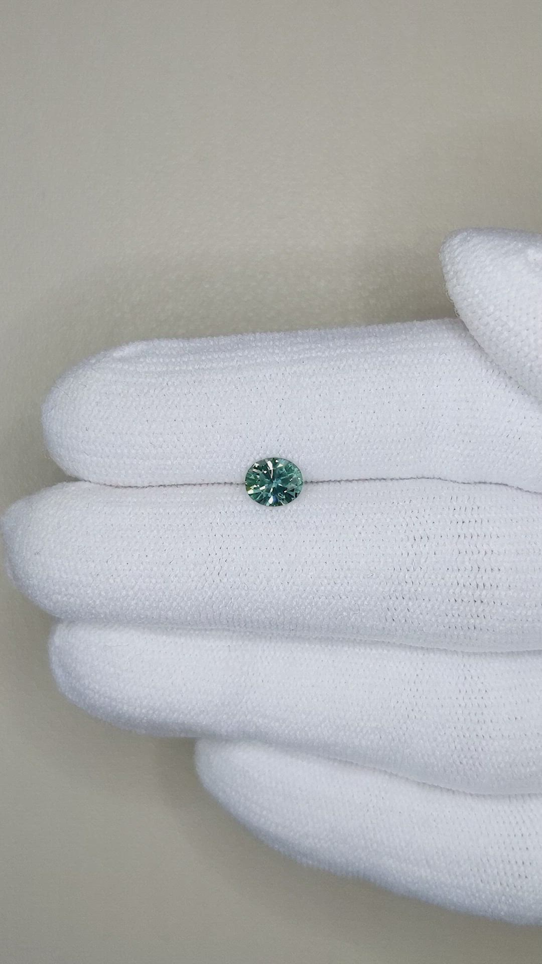 0.68 Ct. Bluish Green Sapphire from Montana Size Video