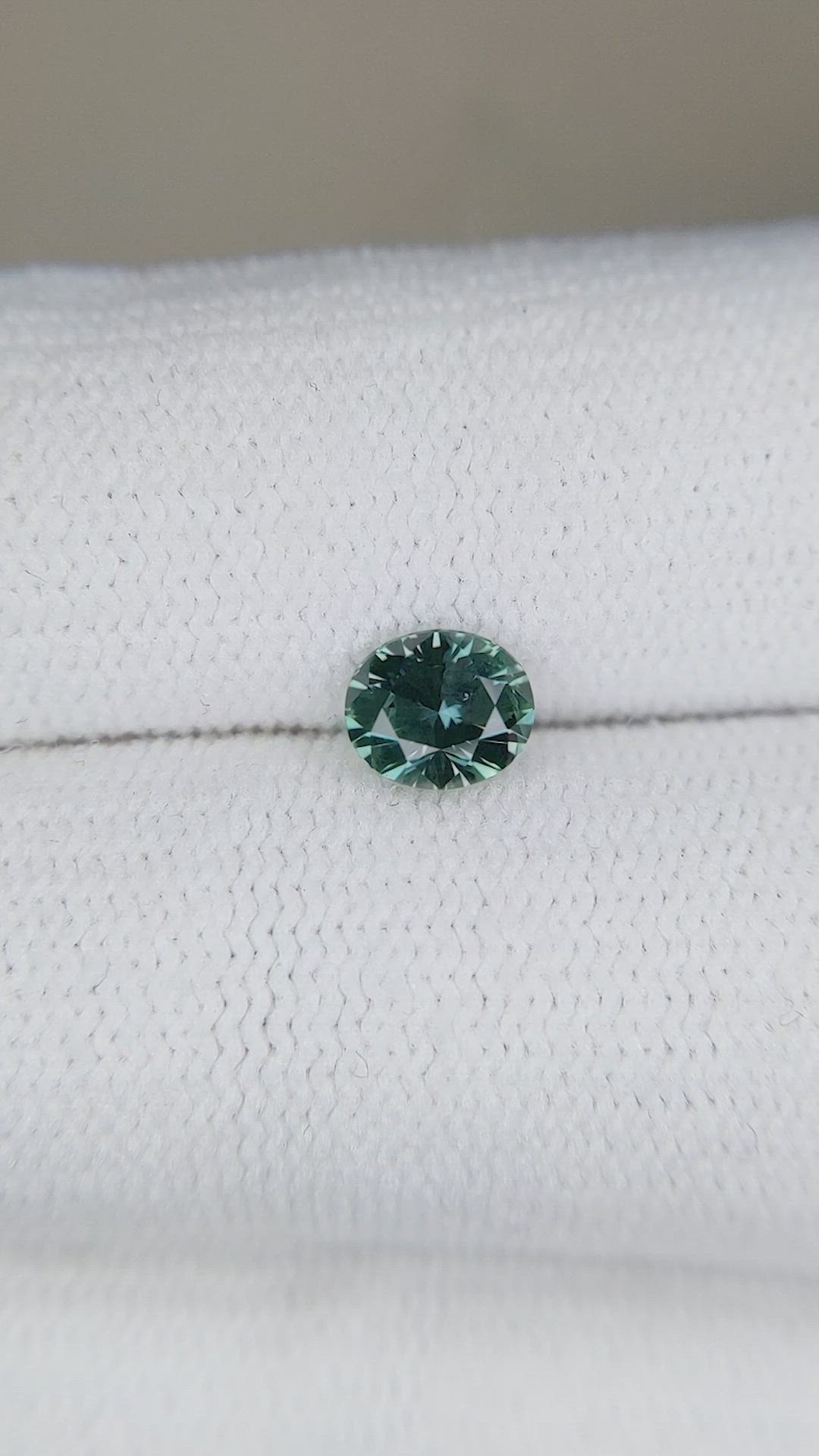 0.68 Ct. Bluish Green Sapphire from Montana Size Video