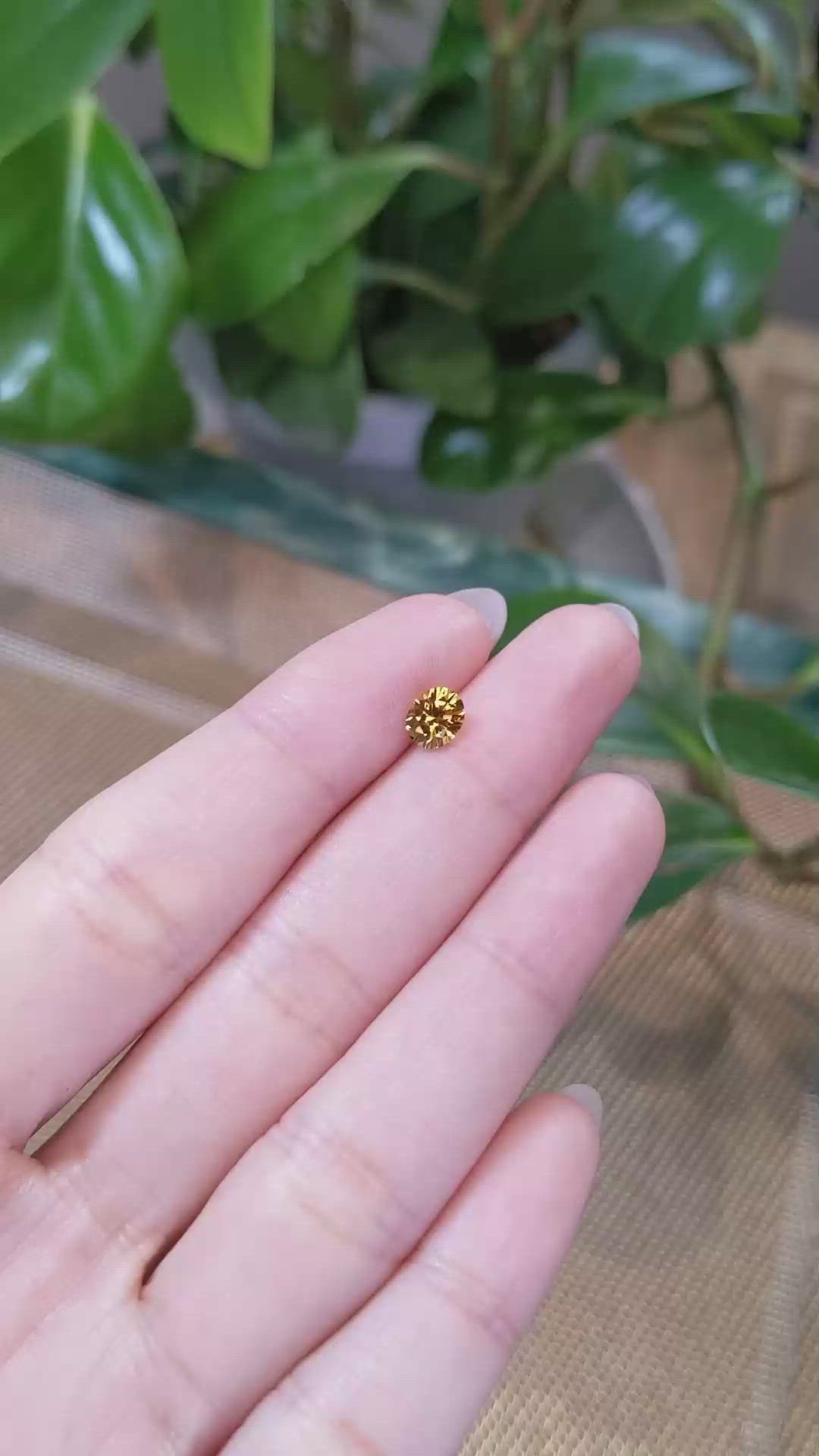 0.89 Ct. Orangish Yellow Sapphire from Montana Size Video