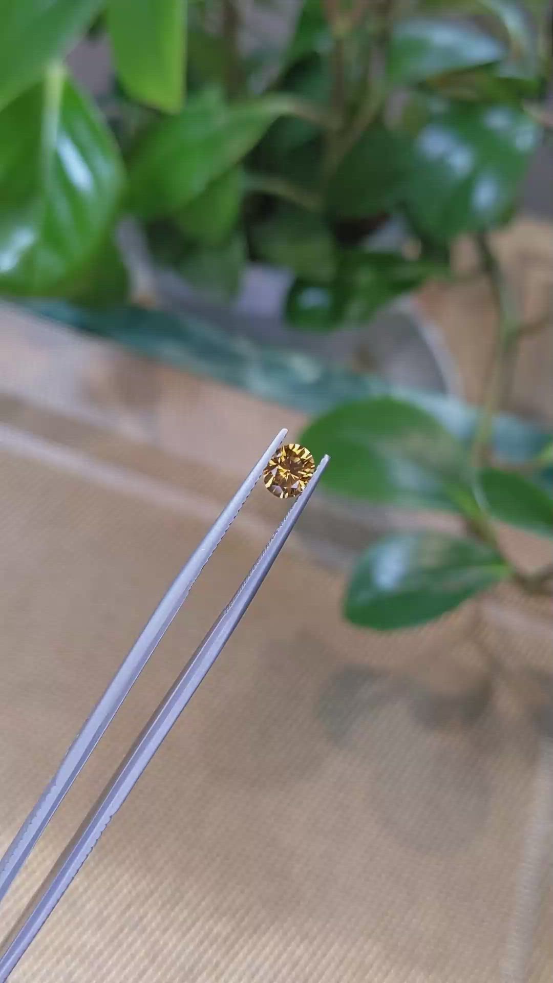 0.89 Ct. Orangish Yellow Sapphire from Montana Size Video