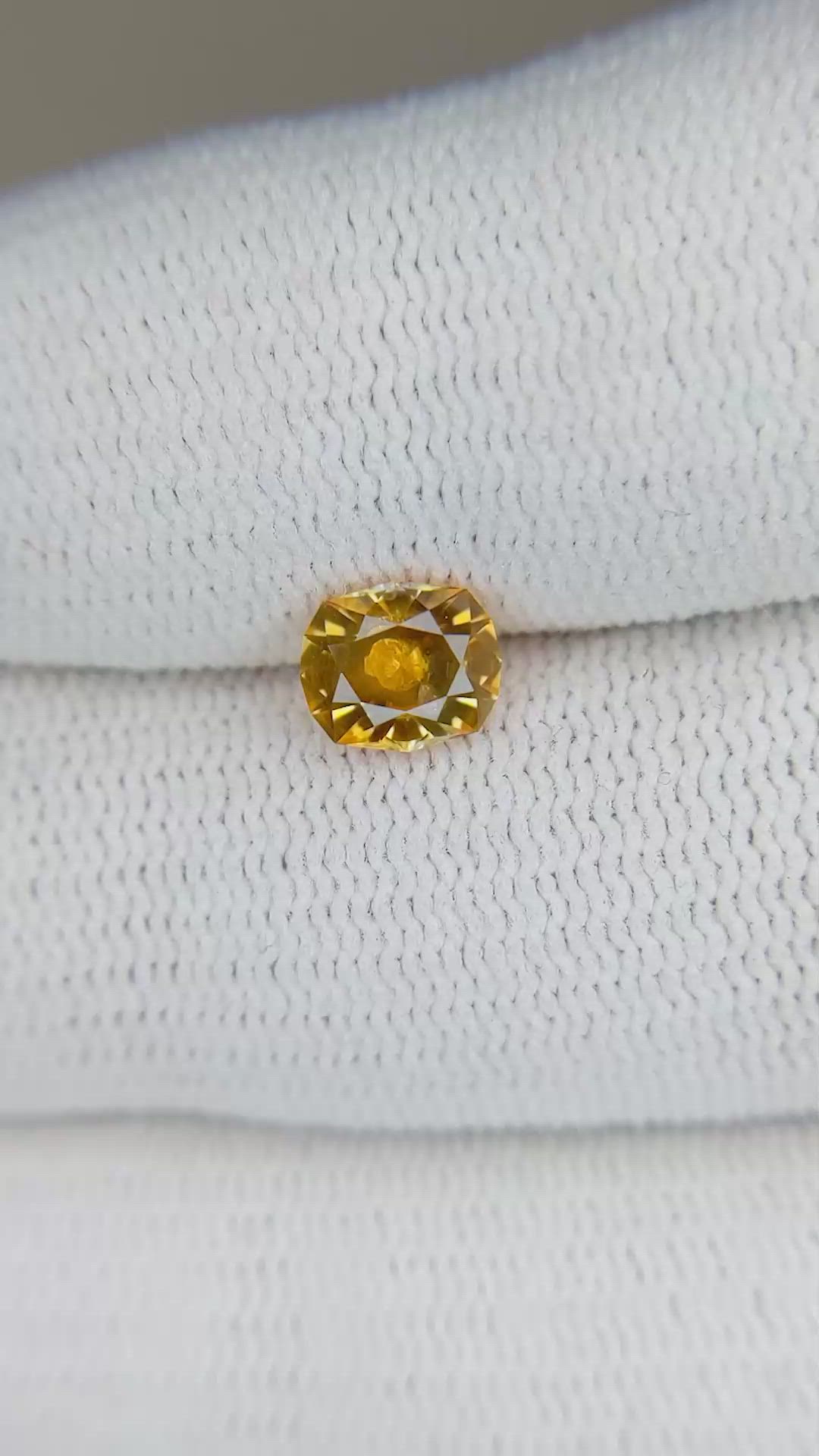 0.89 Ct. Yellowish Orange Sapphire from Montana Size Video