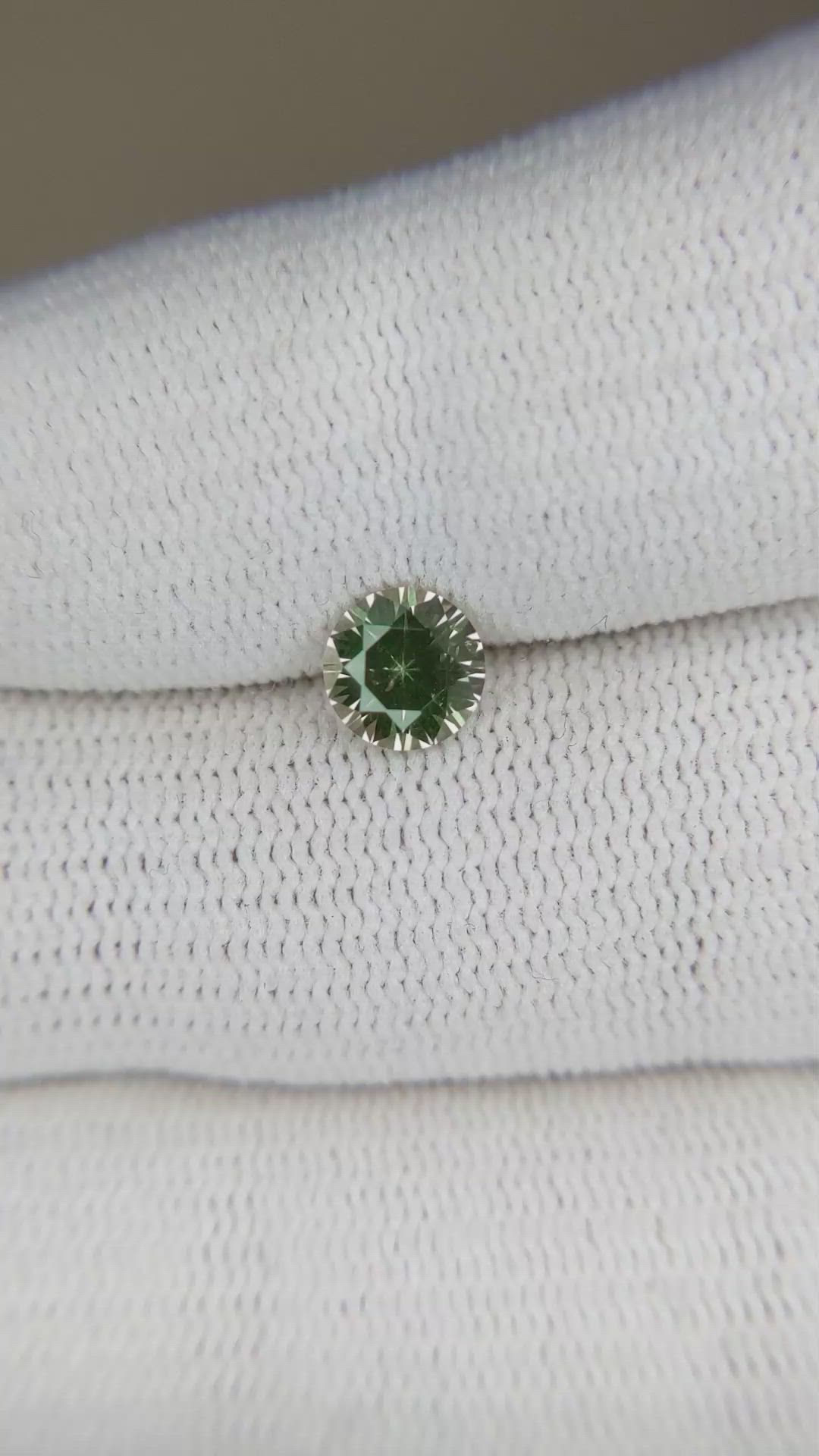 0.94 Ct. Yellowish Green Sapphire from Montana Size Video