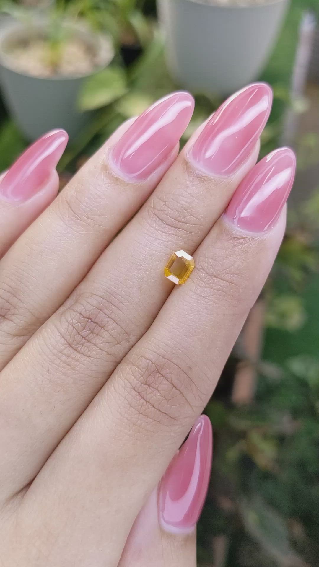 0.92 Ct. Orange Sapphire from Ceylon (Sri Lanka) Size Video