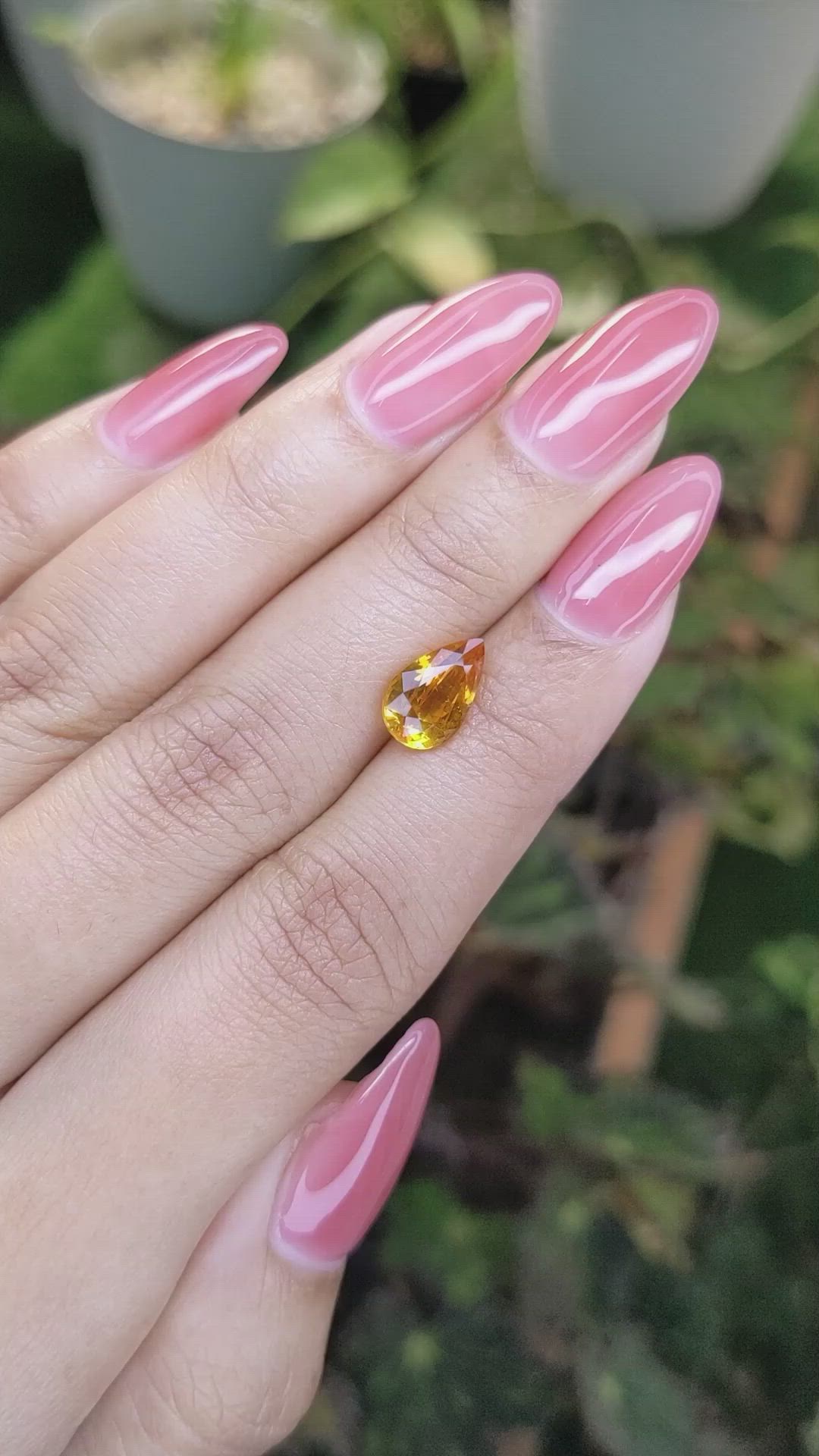 2.63 Ct. Yellowish Orange Sapphire from Ceylon (Sri Lanka) Size Video