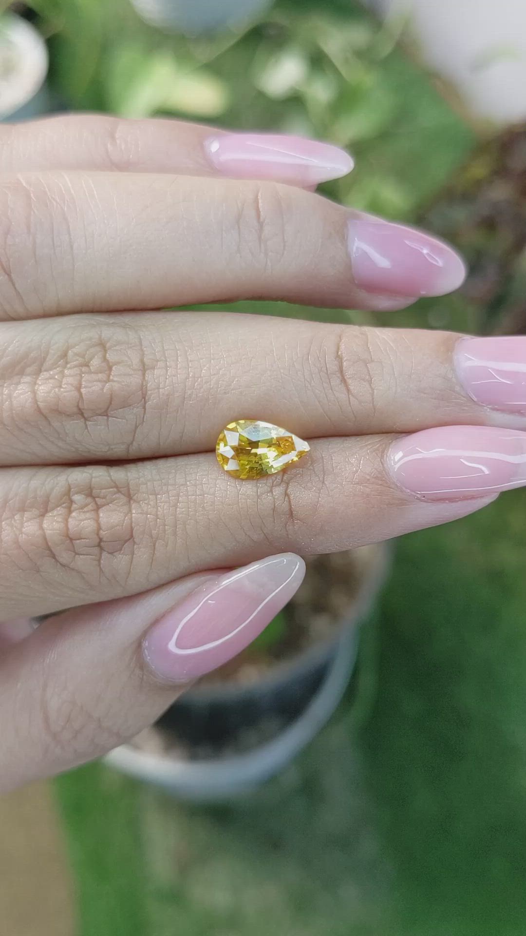2.05 Ct. Orangish Yellow Sapphire from Ceylon (Sri Lanka) Size Video