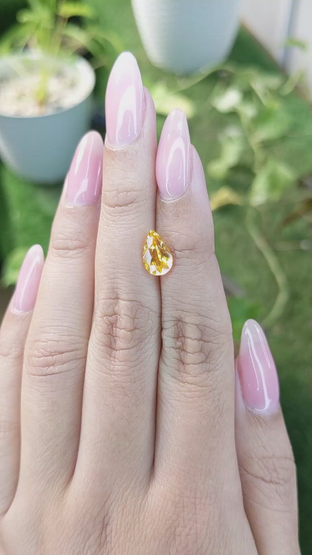 2.05 Ct. Orangish Yellow Sapphire from Ceylon (Sri Lanka) Size Video