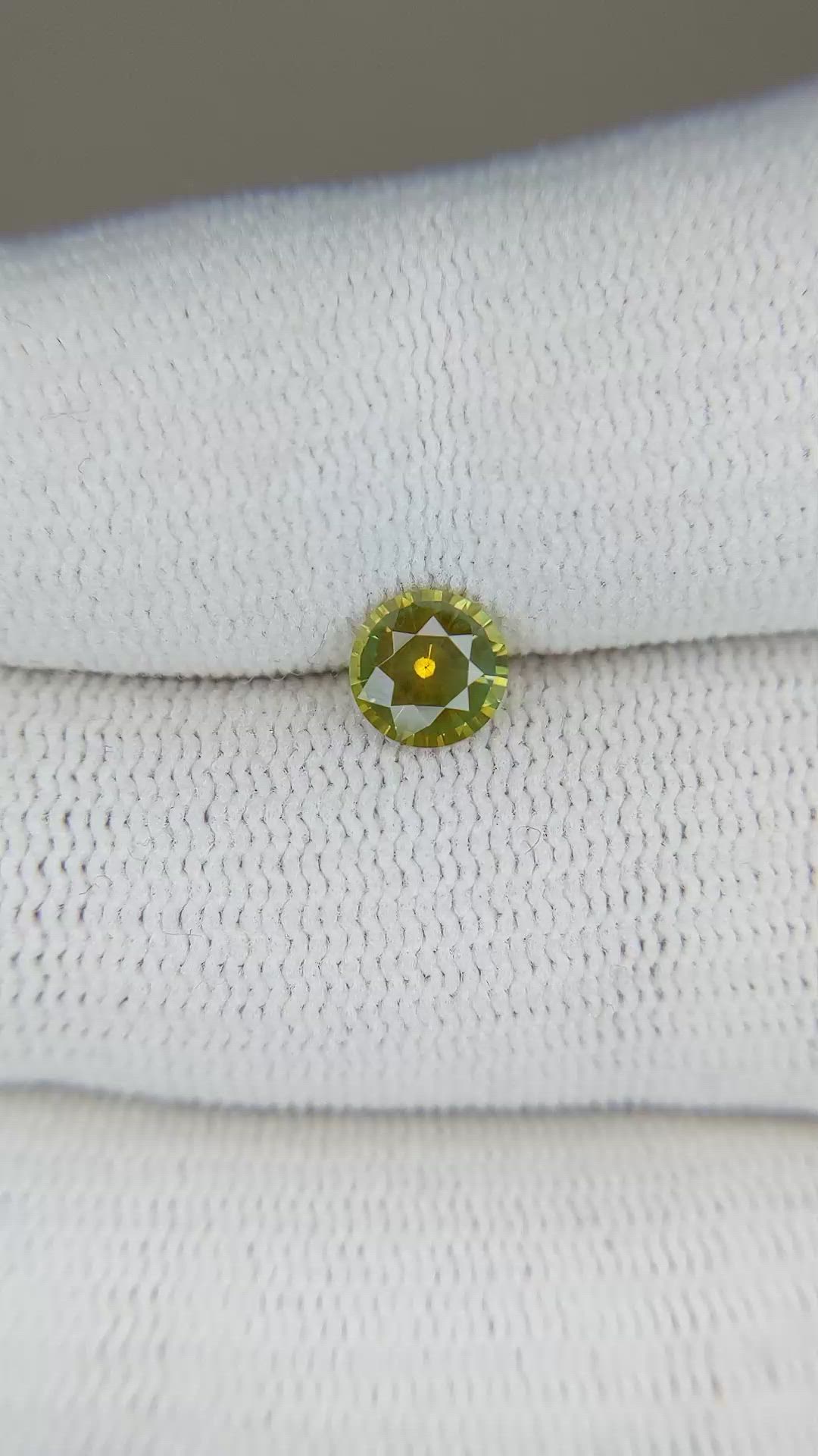 0.79 Ct. Yellowish Green Sapphire from Montana Size Video