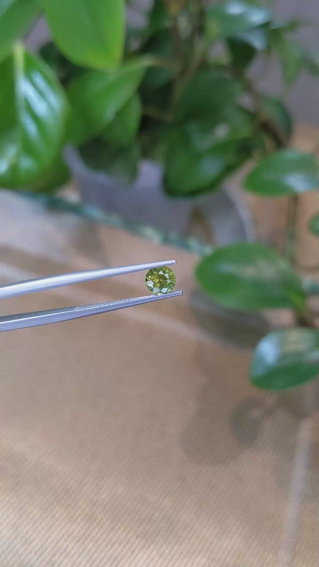 0.79 Ct. Yellowish Green Sapphire from Montana Size Video