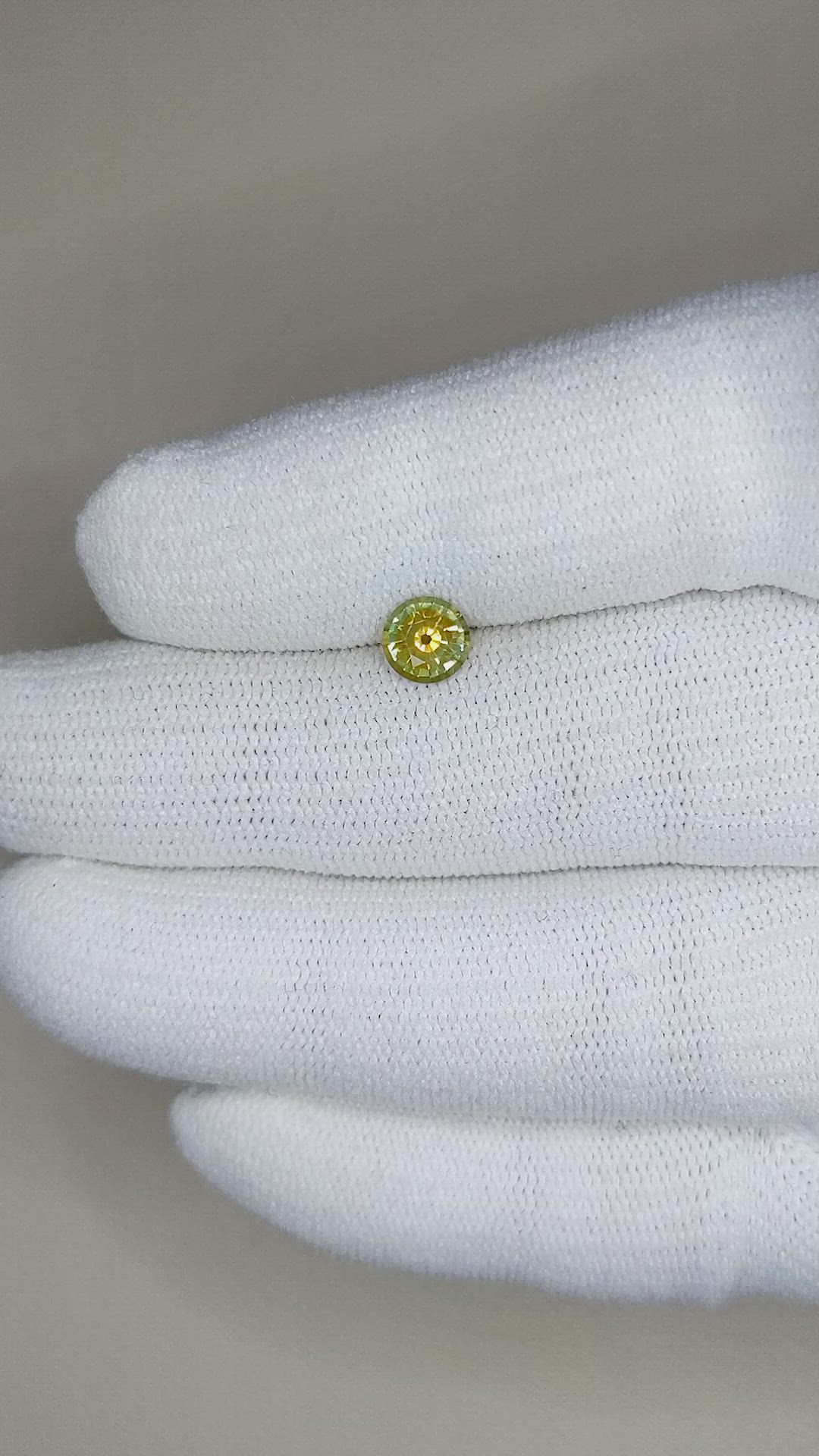 0.79 Ct. Yellowish Green Sapphire from Montana Size Video