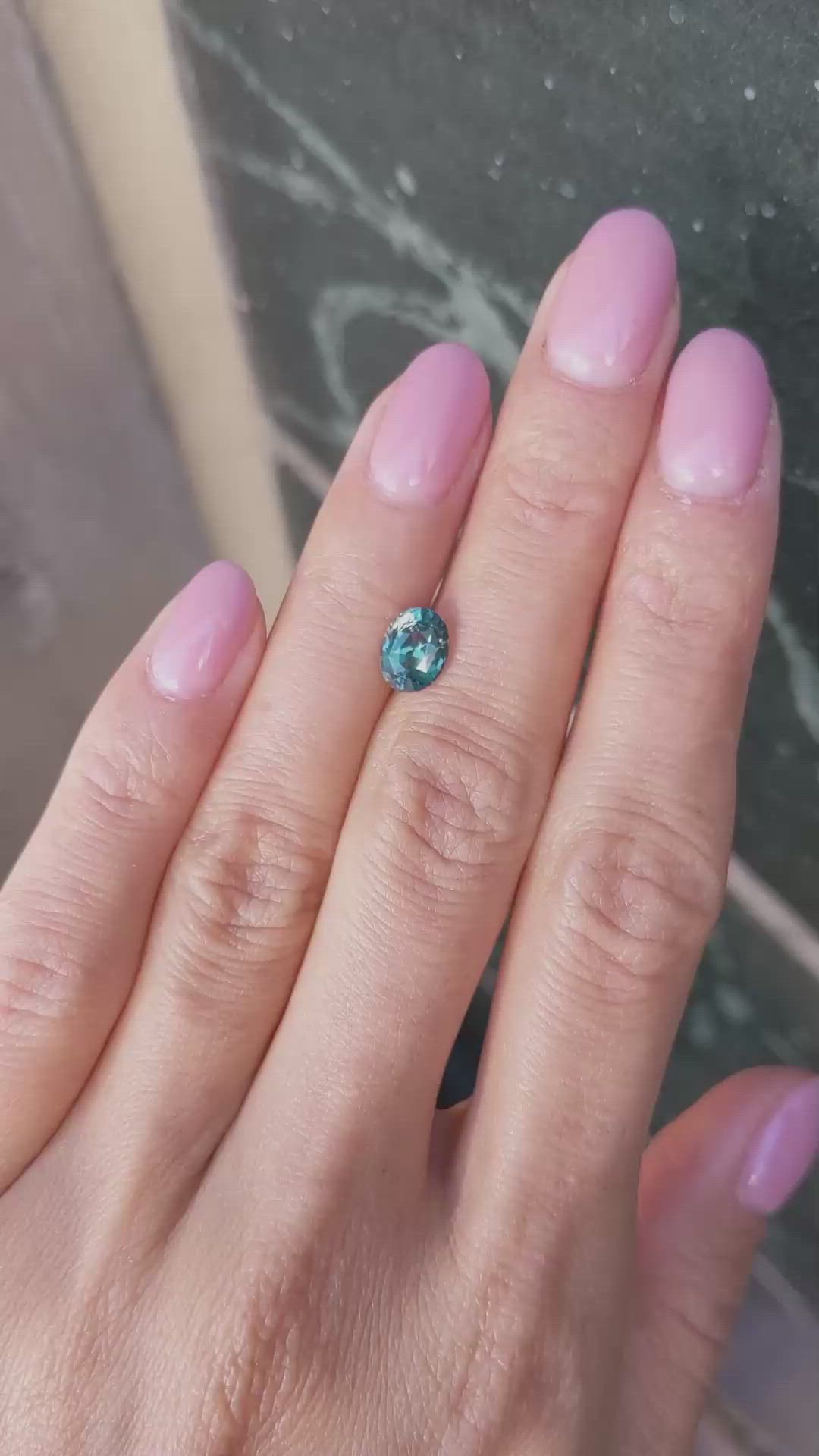 1.57 Ct. Bluish Green Sapphire from Madagascar Size Video