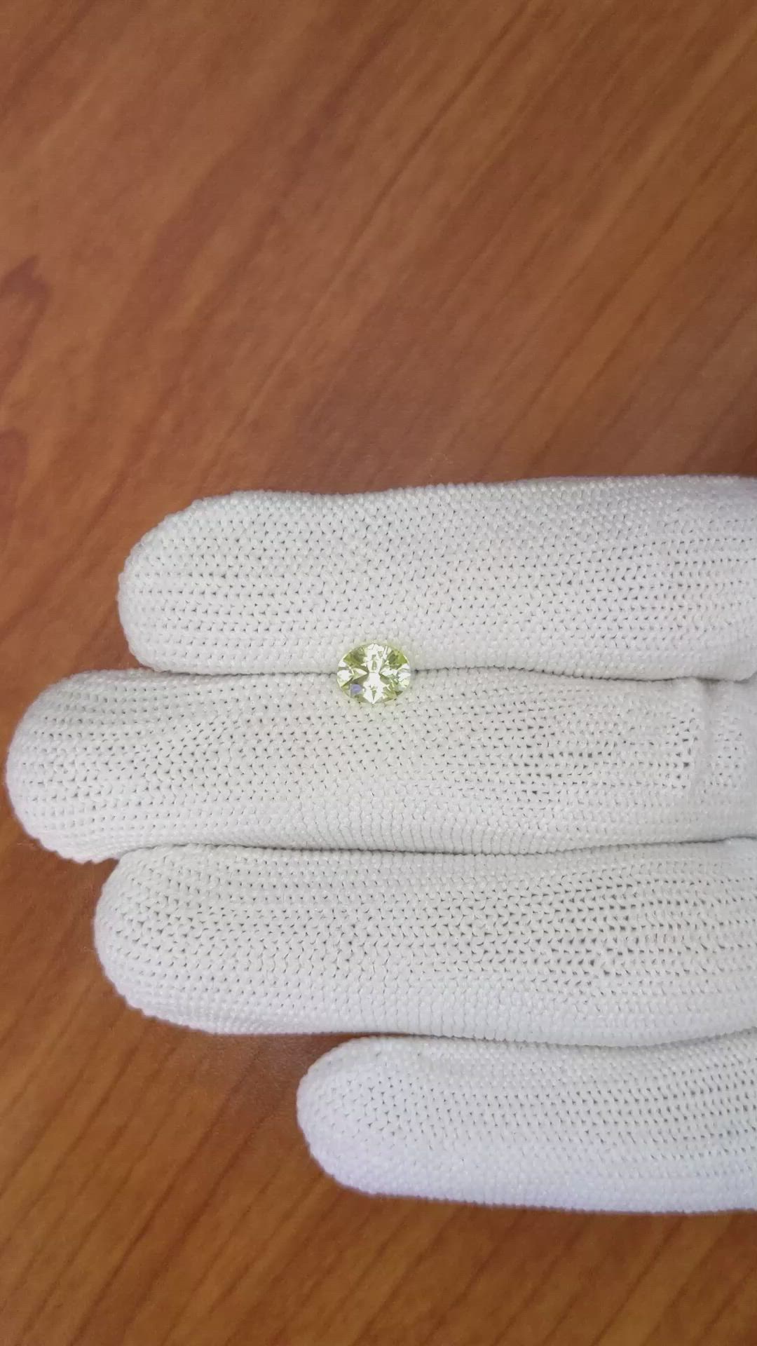 0.78 Ct. Greenish Yellow Sapphire from Ceylon (Sri Lanka) Size Video