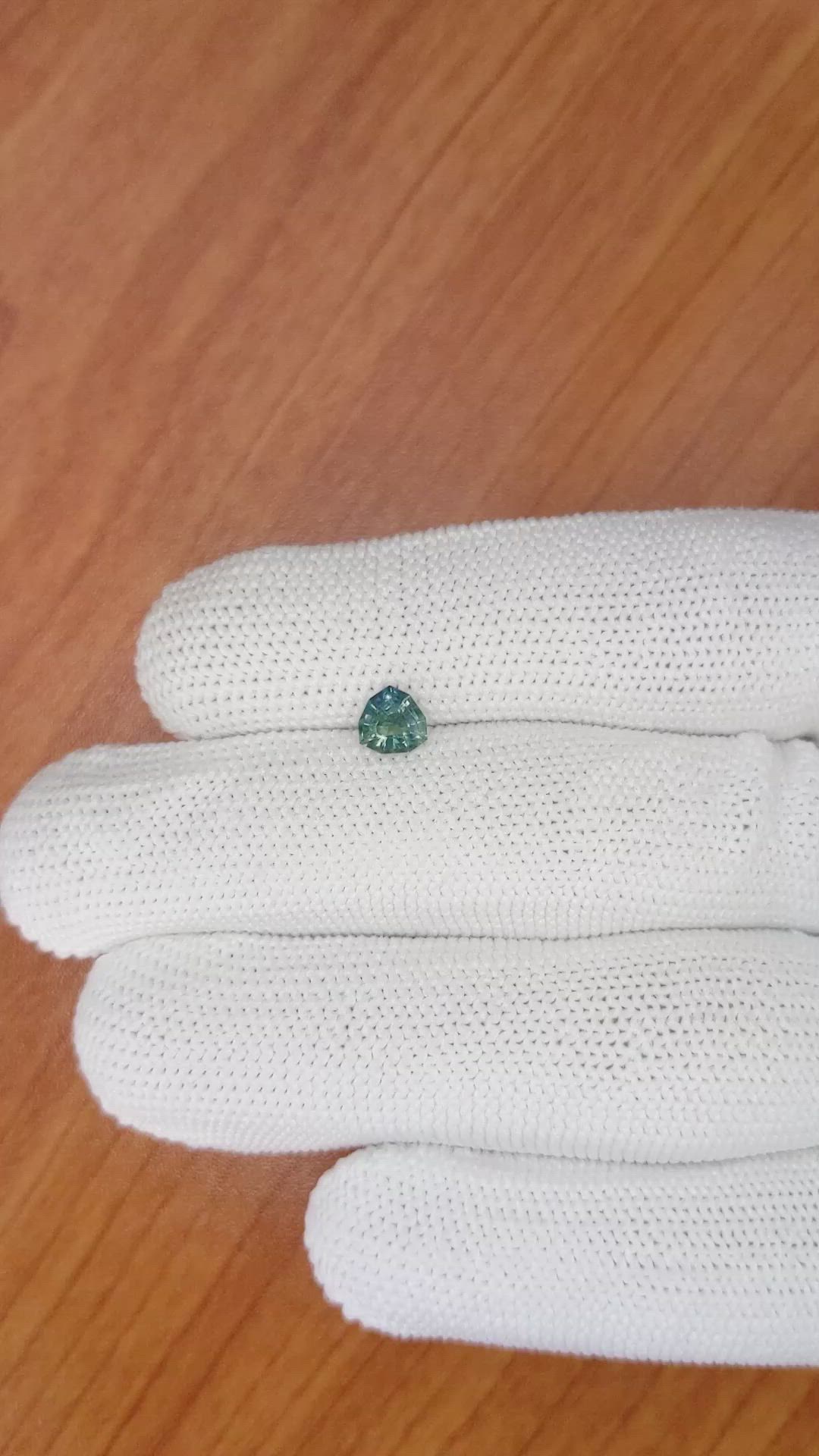 0.89 Ct. Bluish Green Sapphire from Madagascar Size Video