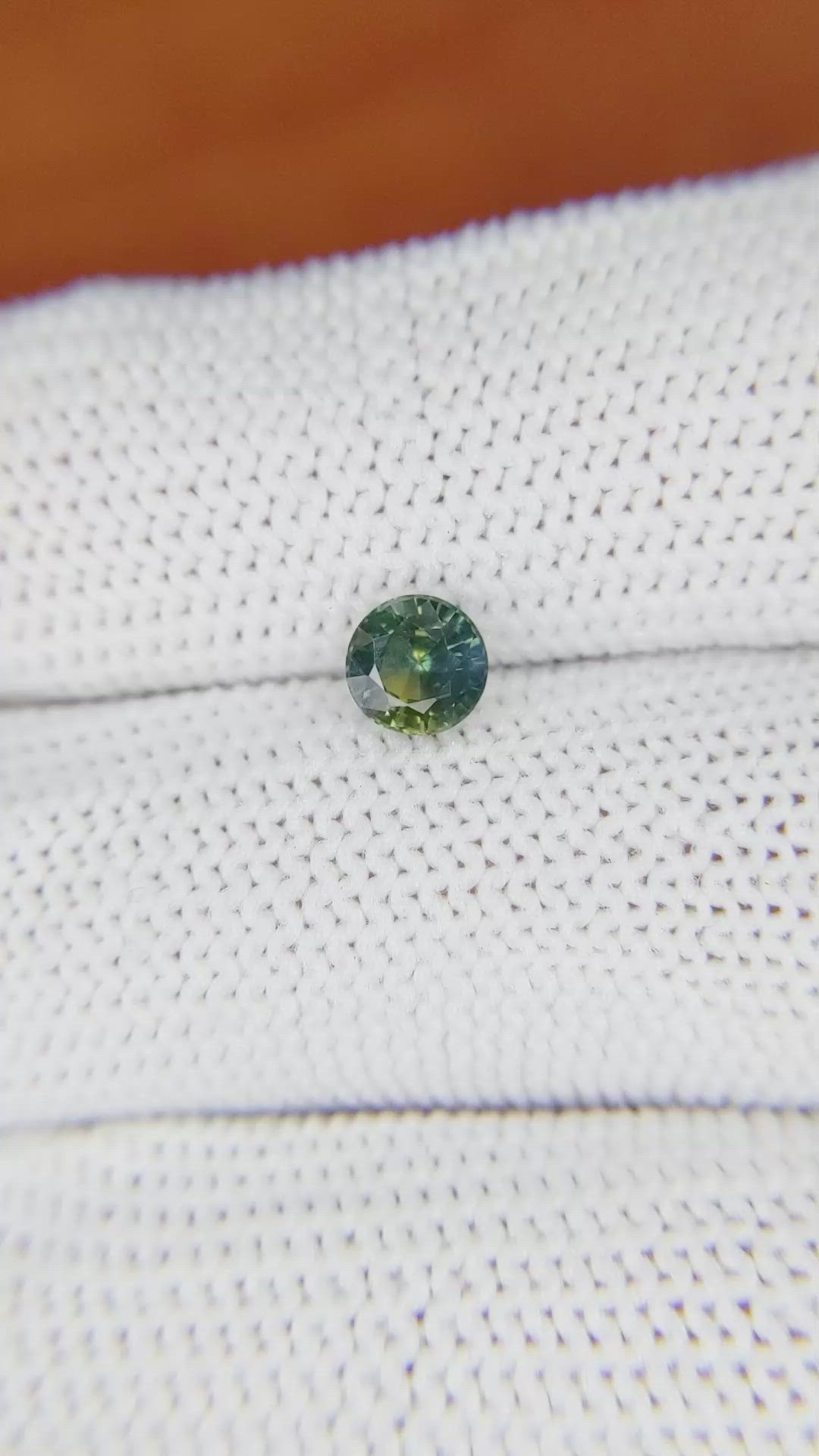 0.74 Ct. Yellowish Green Sapphire from Madagascar Size Video
