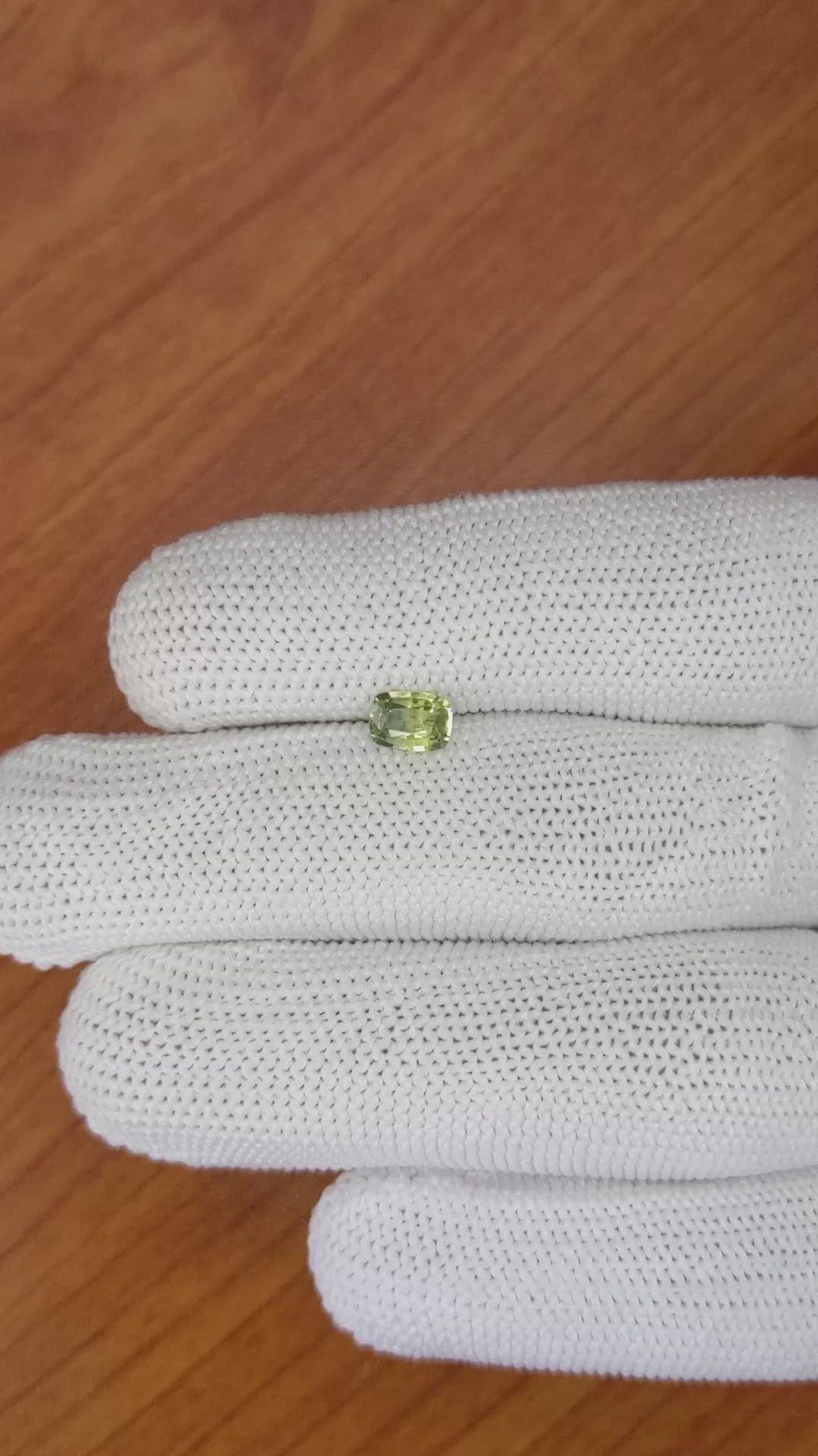 0.66 Ct. Yellowish Green Sapphire from Madagascar Size Video