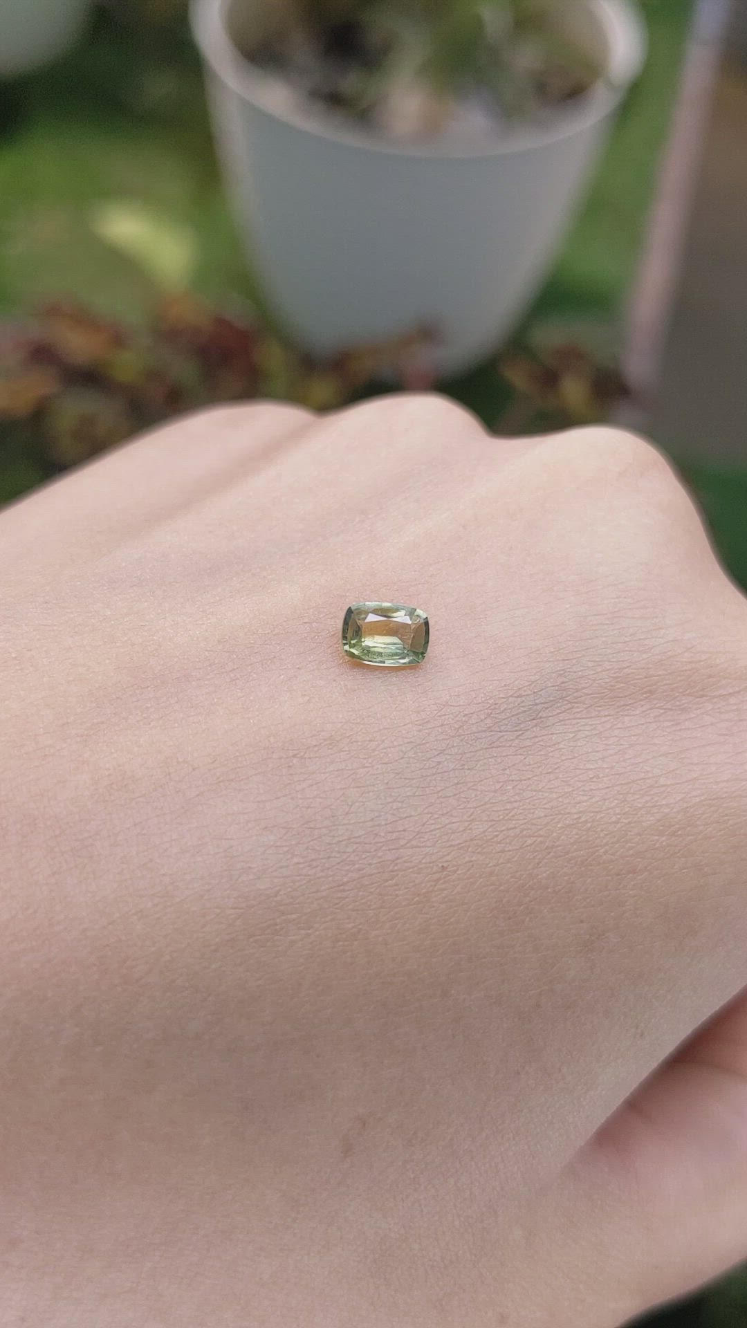 0.66 Ct. Yellowish Green Sapphire from Madagascar Size Video