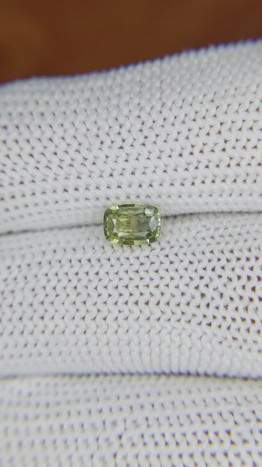 0.66 Ct. Yellowish Green Sapphire from Madagascar Size Video