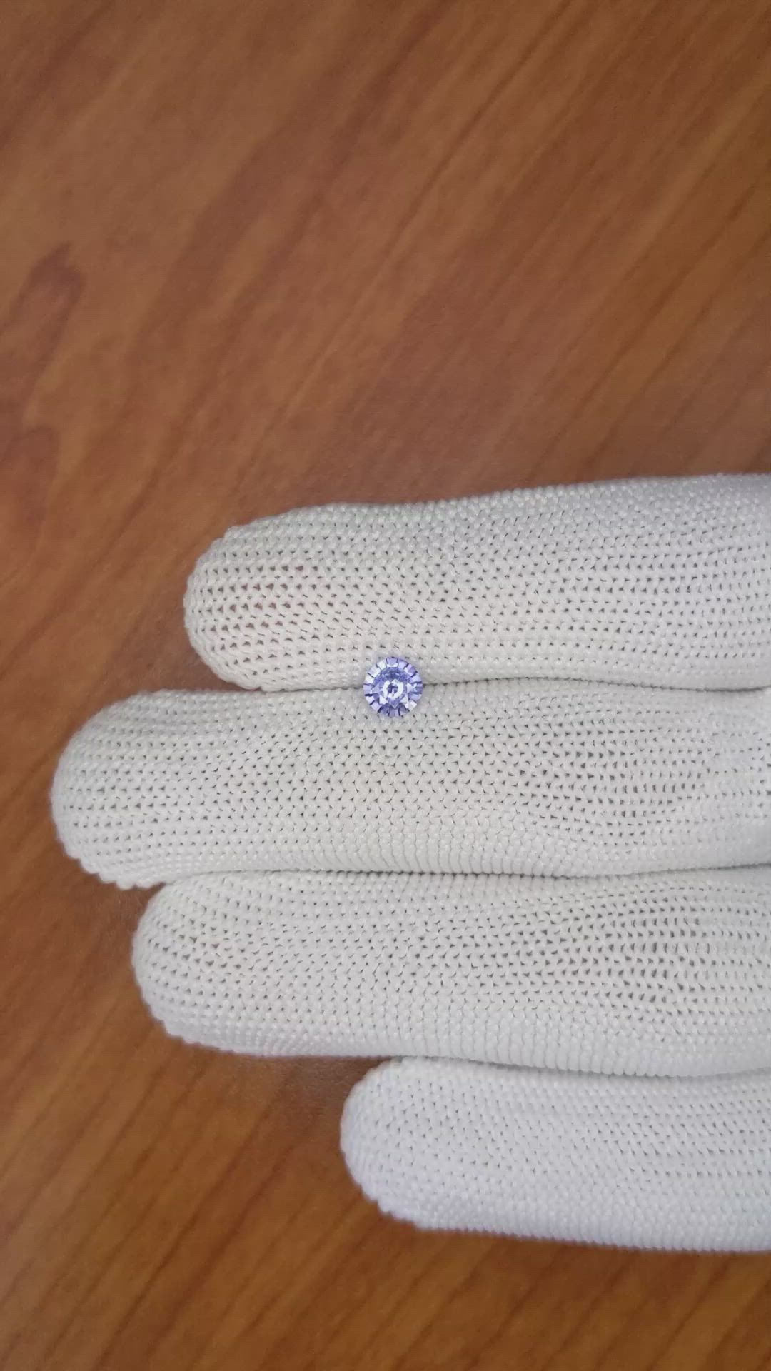 0.55 Ct. Violet Sapphire from Madagascar Size Video