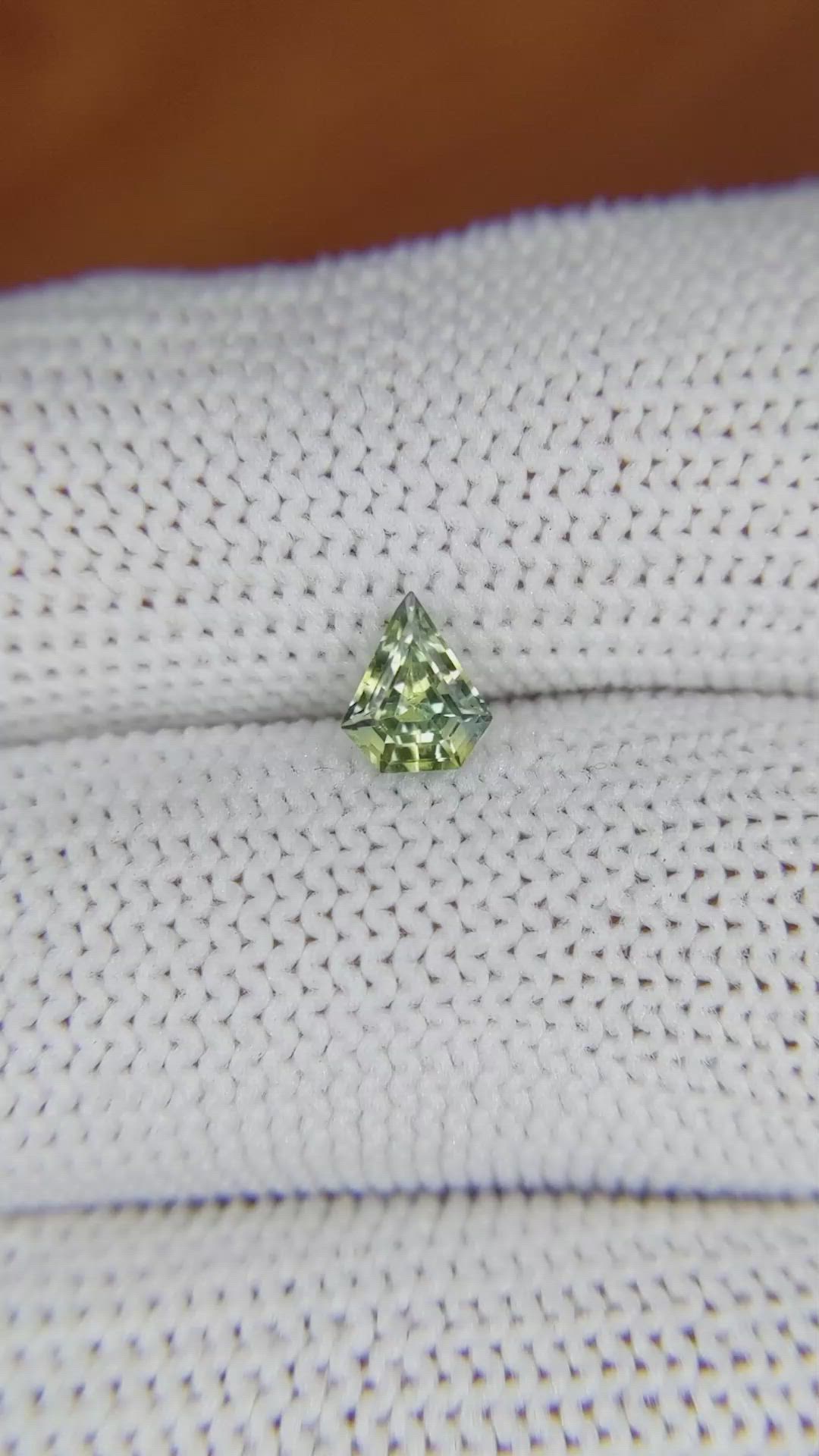 0.66 Ct. Yellowish Green Sapphire from Madagascar Size Video