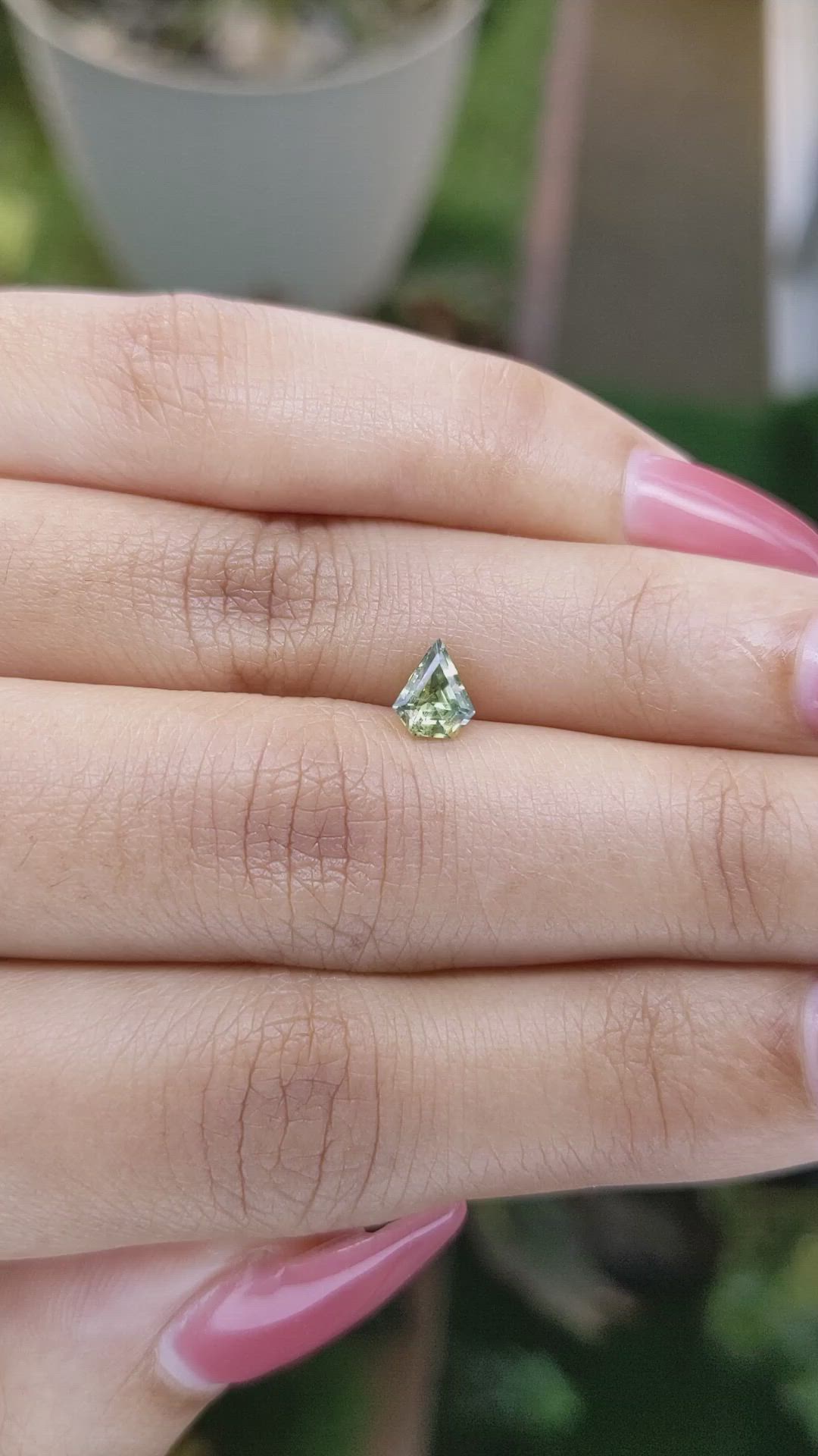 0.66 Ct. Yellowish Green Sapphire from Madagascar Size Video