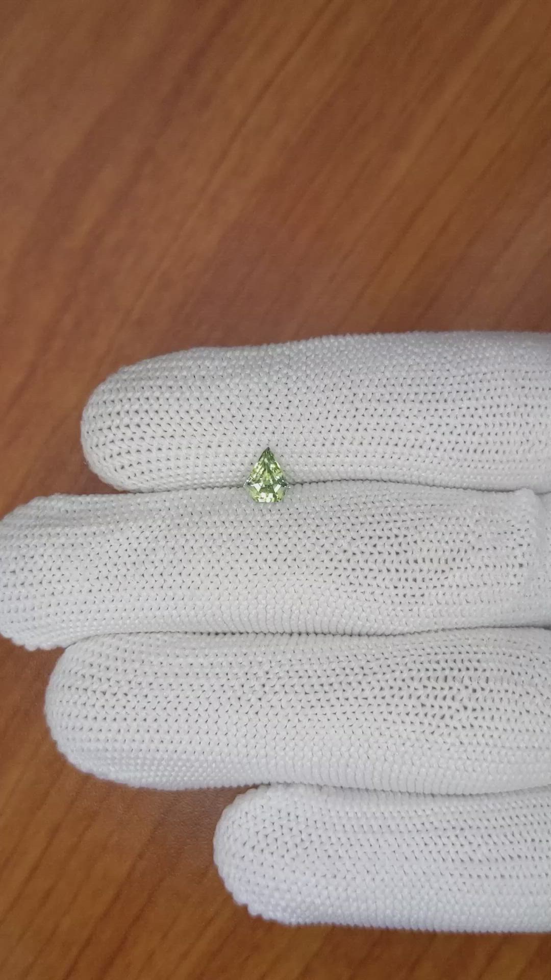0.66 Ct. Yellowish Green Sapphire from Madagascar Size Video