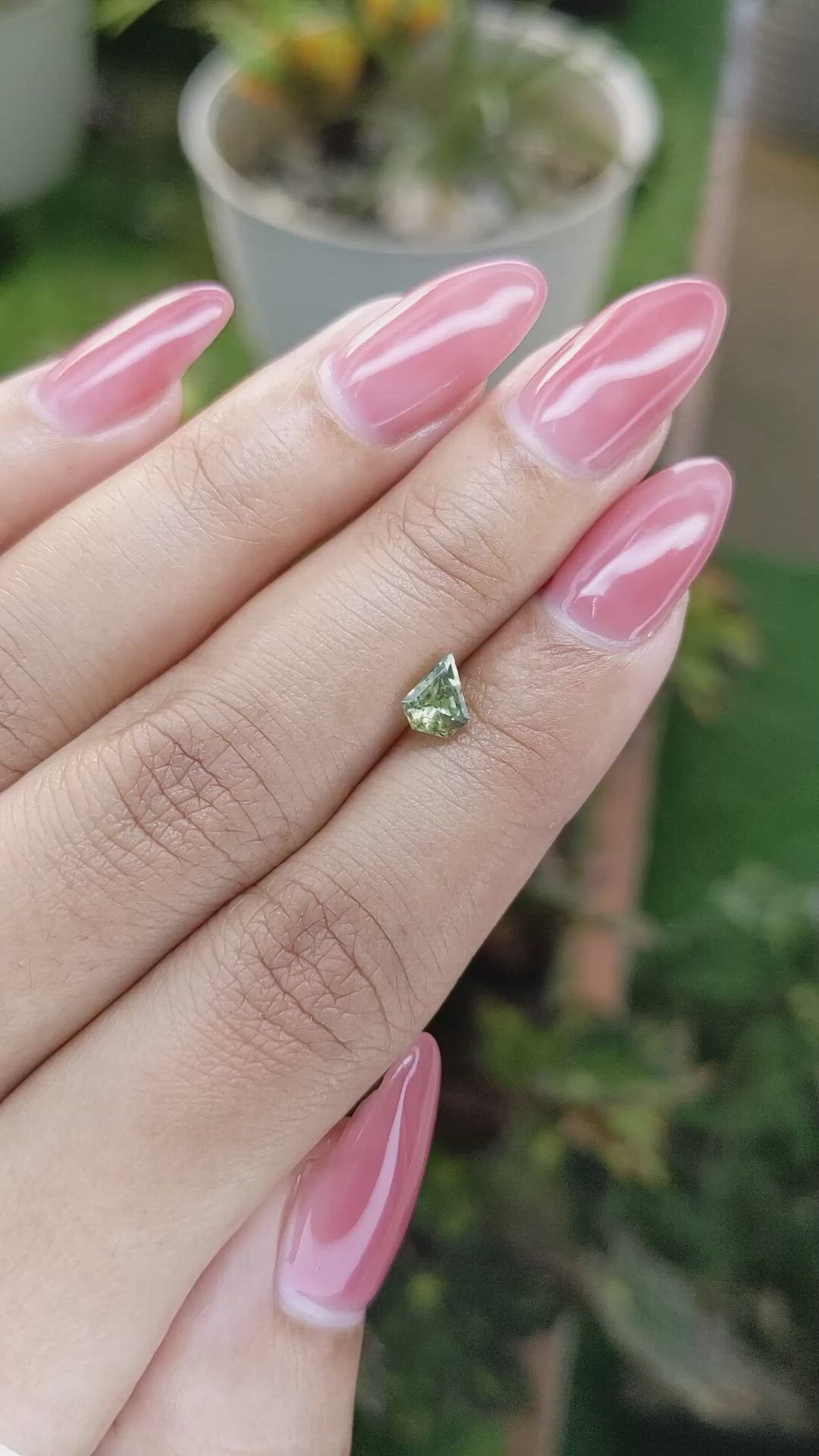 0.66 Ct. Yellowish Green Sapphire from Madagascar Size Video